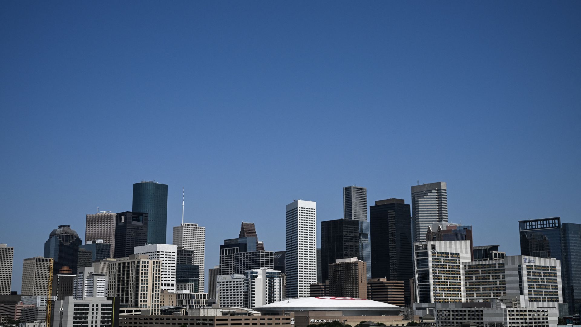 Skyline of Houston, blue skies.