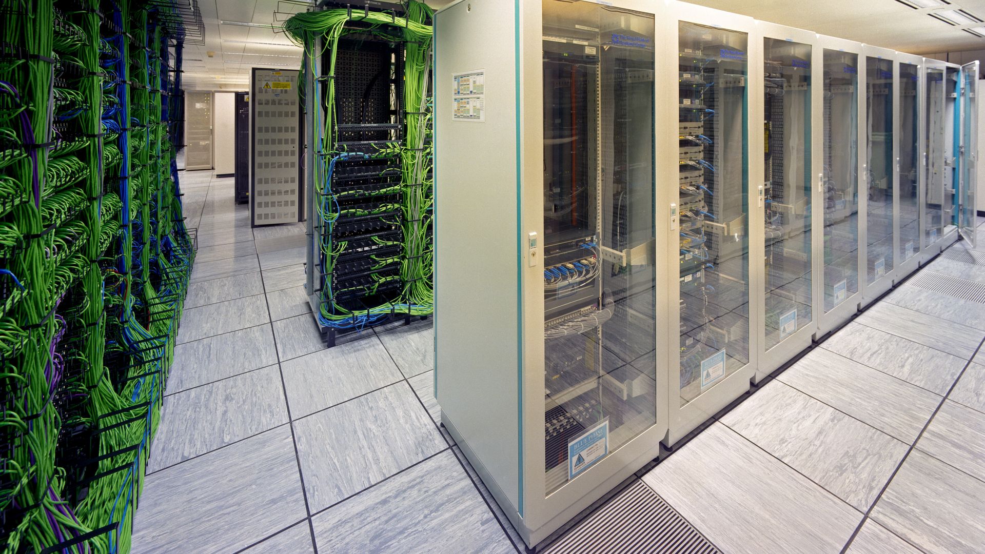 Data center green wires on left white cases on right