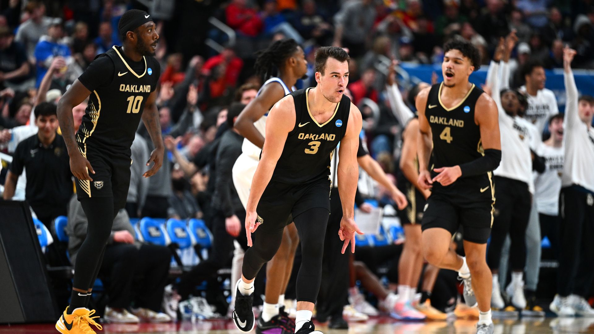 Oakland's Jack Gohlke celebrates after scoring a three pointer against Kentucky. 