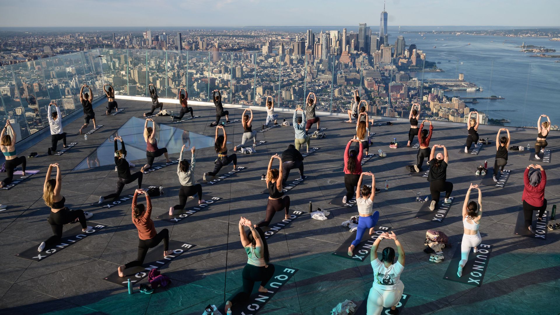 People doing yoga on the Edge Observation Deck in New York City on June 17.