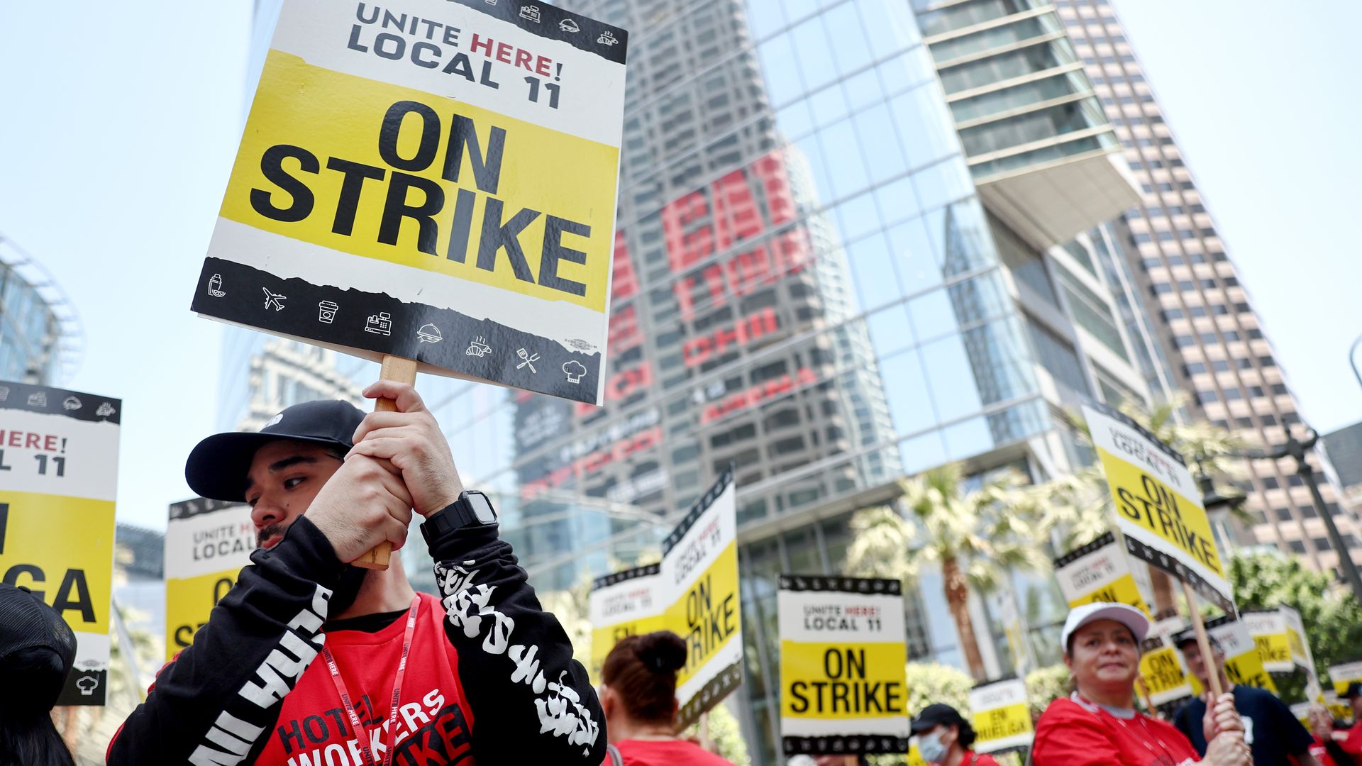 Hotel workers with Unite Here Local 11 picket outside the InterContinental hotel on the first day of a strike by union members at many major hotels in Southern California on July 2, 2023 in Los Angeles, California.