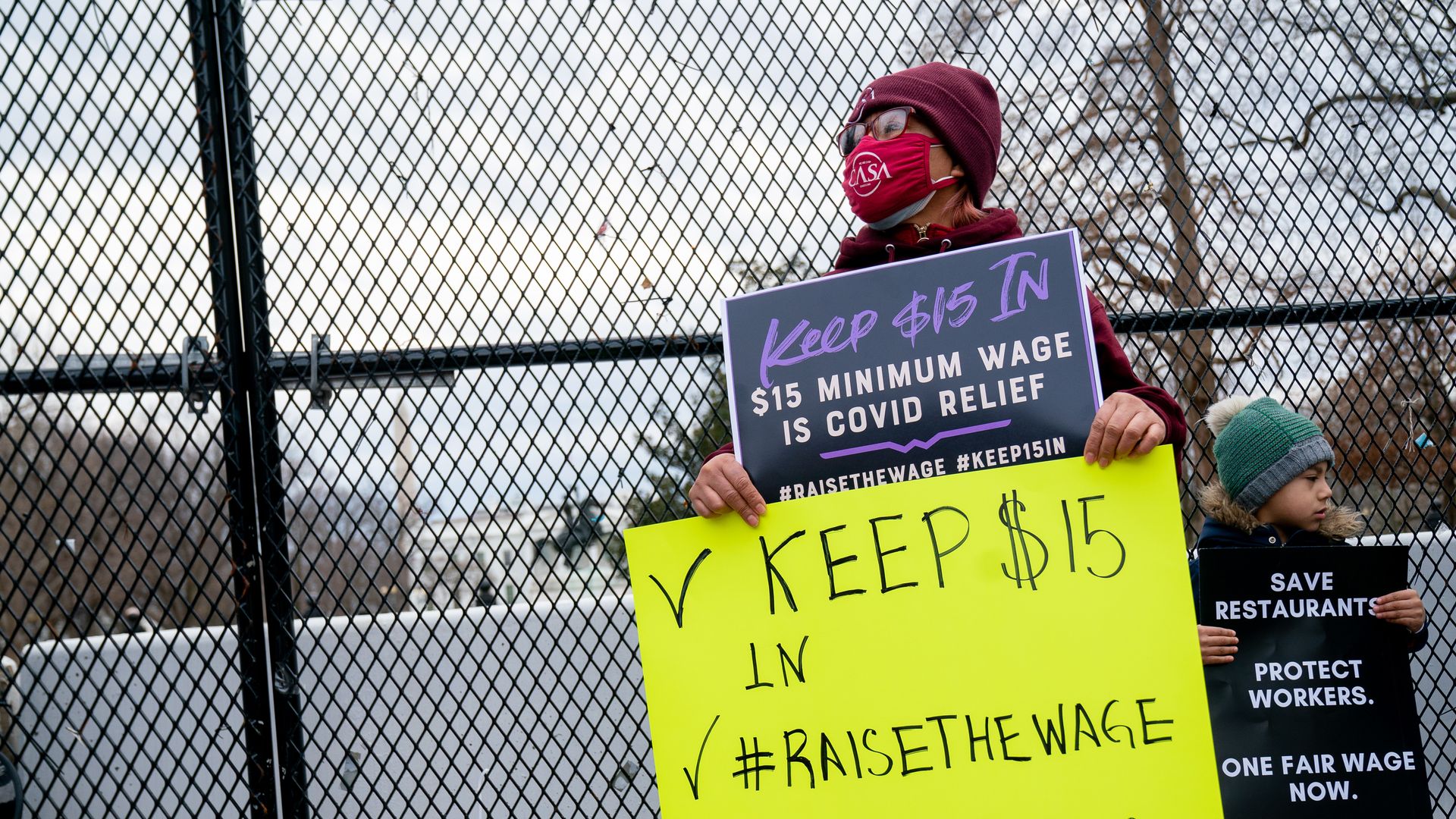Protesters demand a federal $15-per-hour minimum wage near the White House in Washington, D.C.