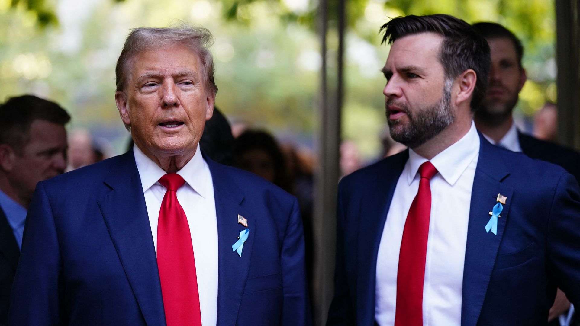 Former US President and Republican presidential candidate Donald Trump (L) and US Senator from Ohio and Republican vice presidential candidate J.D. Vance attend a remembrance ceremony on the 23rd anniversary of the September 11 terror attack on the World Trade Center at Ground Zero, in NYC.