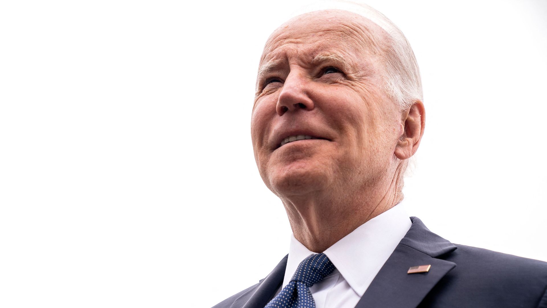 President Joe Biden speaks to reporters after disembarking Air Force One at Joint Base Andrews in Maryland on April 25, 2022