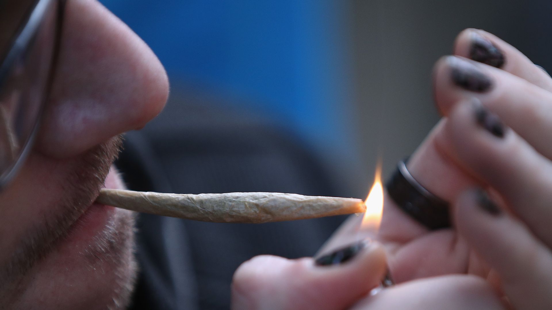 Someone smoking a marijuana cigarette in New York in April 2020.