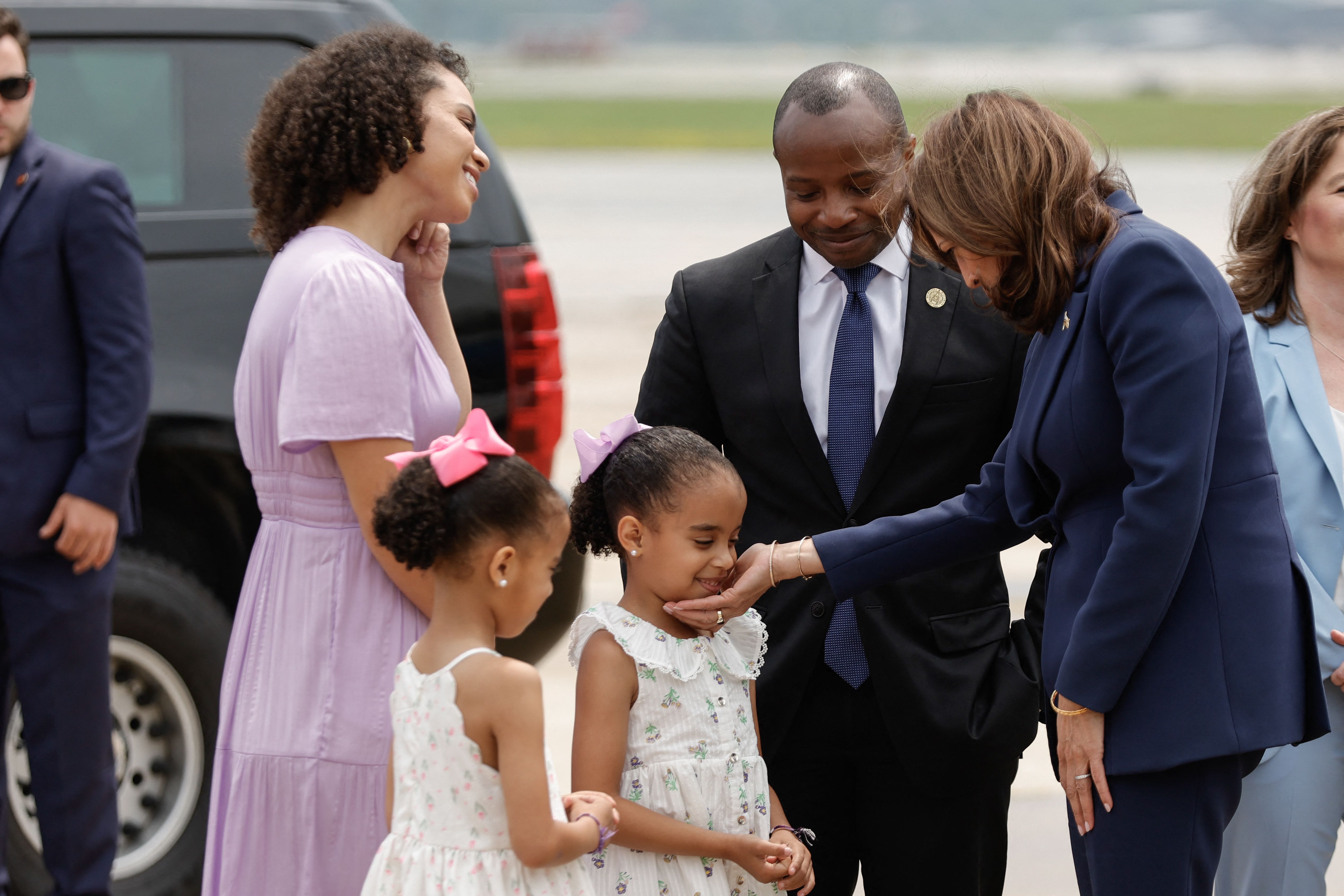 Vice President Harris is greeted by Milwaukee Mayor Cavalier Johnson and his family yesterday.