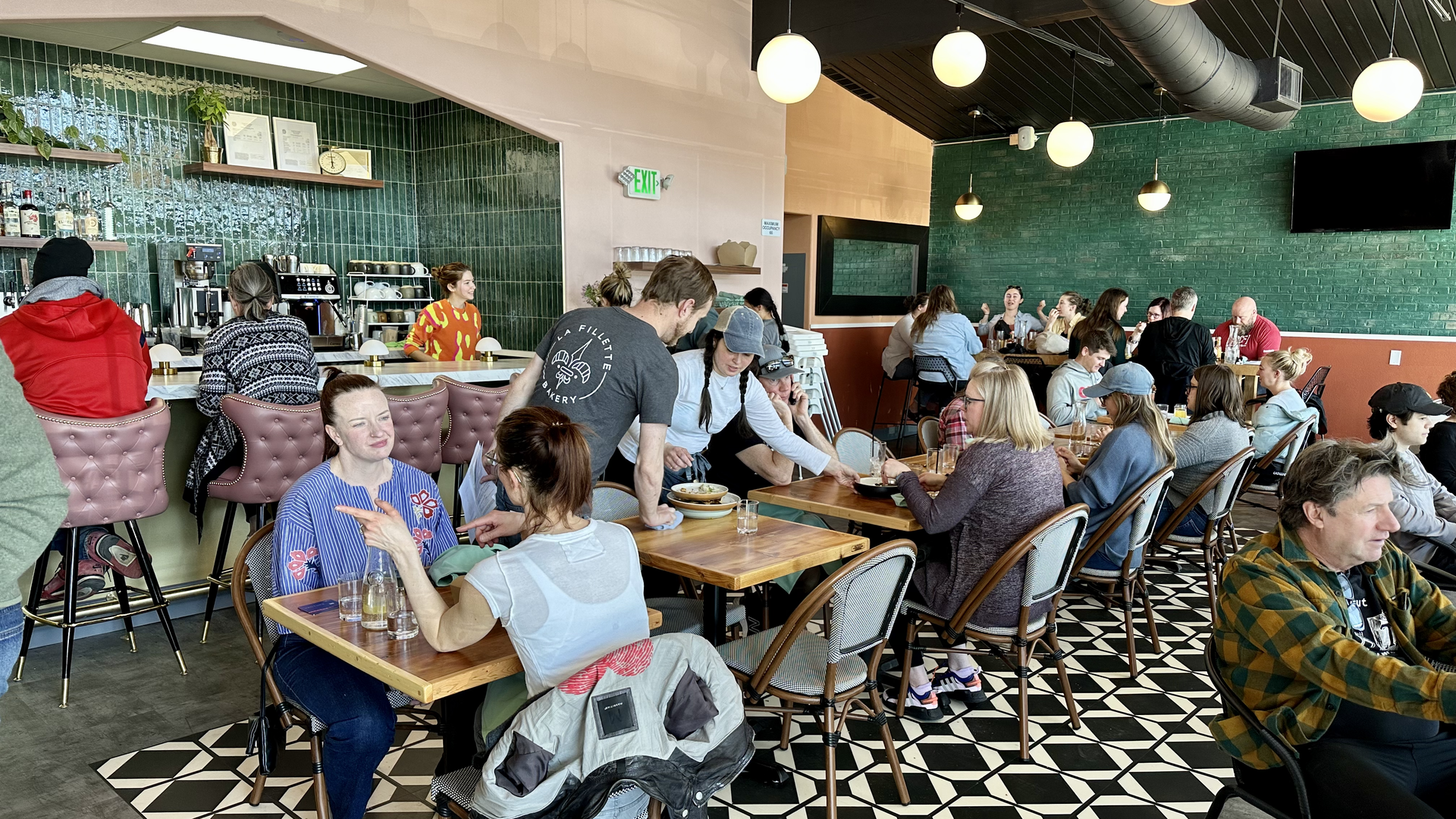 Inside a packed La Fillette Bakery on opening weekend. Photo: John Frank/Axios