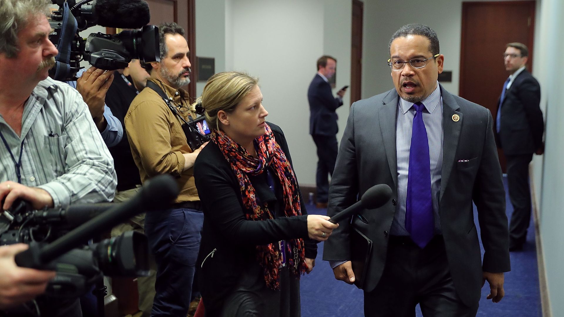 Democratic National Committee Deputy Chair Rep. Keith Ellison (D-MN) (R) talks to reporters