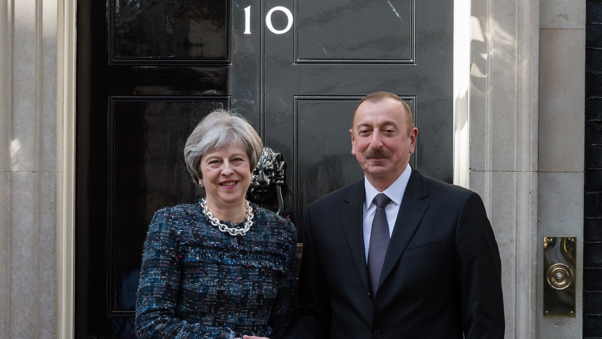 Azerbaijani President Ilham Aliyev and former UK prime minister theresa may