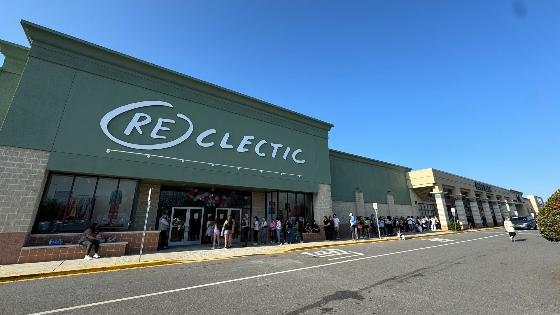 Line of people outside store