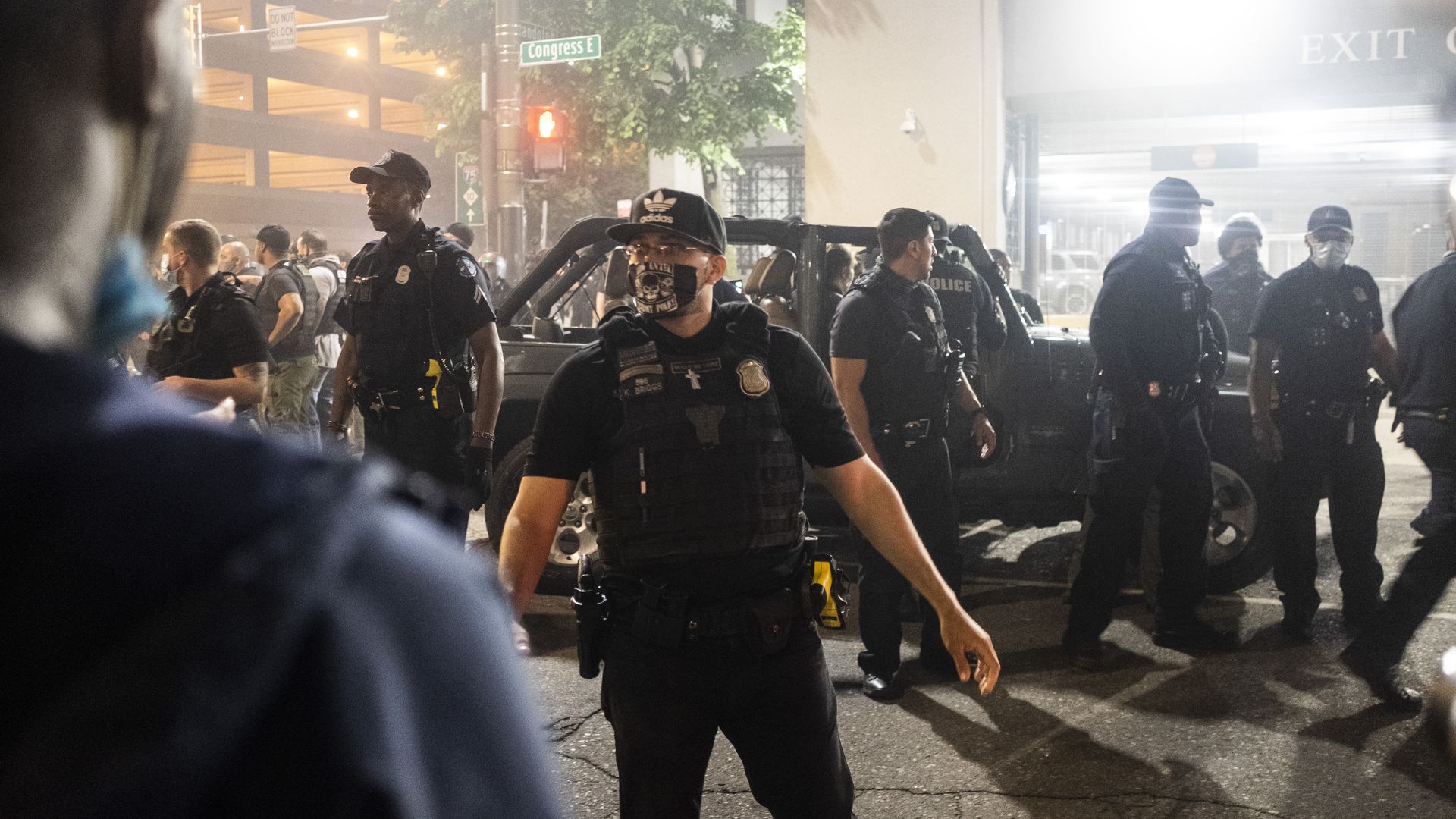 Detroit police detain and arrest protesters during a series of confrontations on May 29,