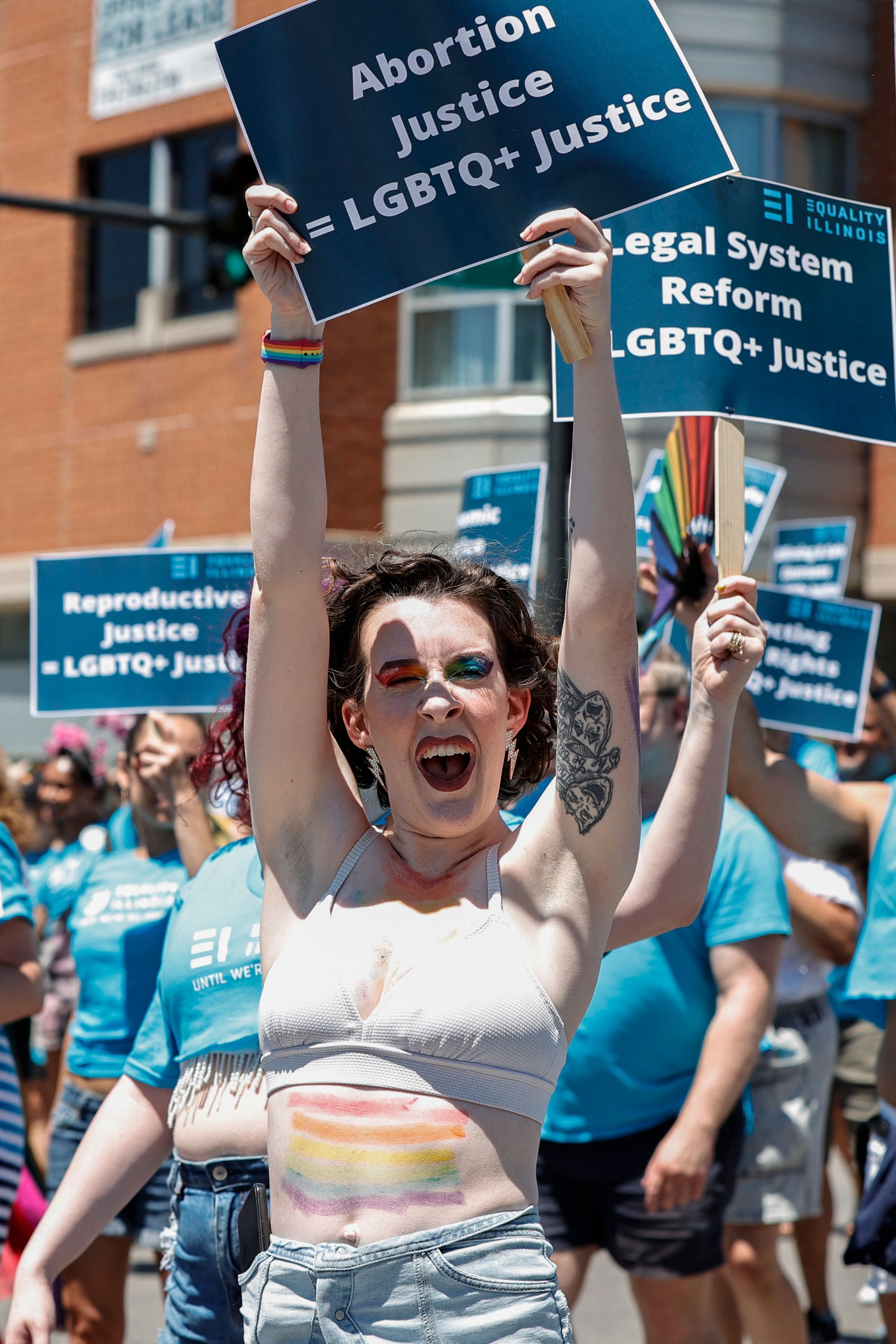 A person holds an abortion rights placard during the 51st LGBTQ Pride Parade in Chicago, Illinois, on June 26.