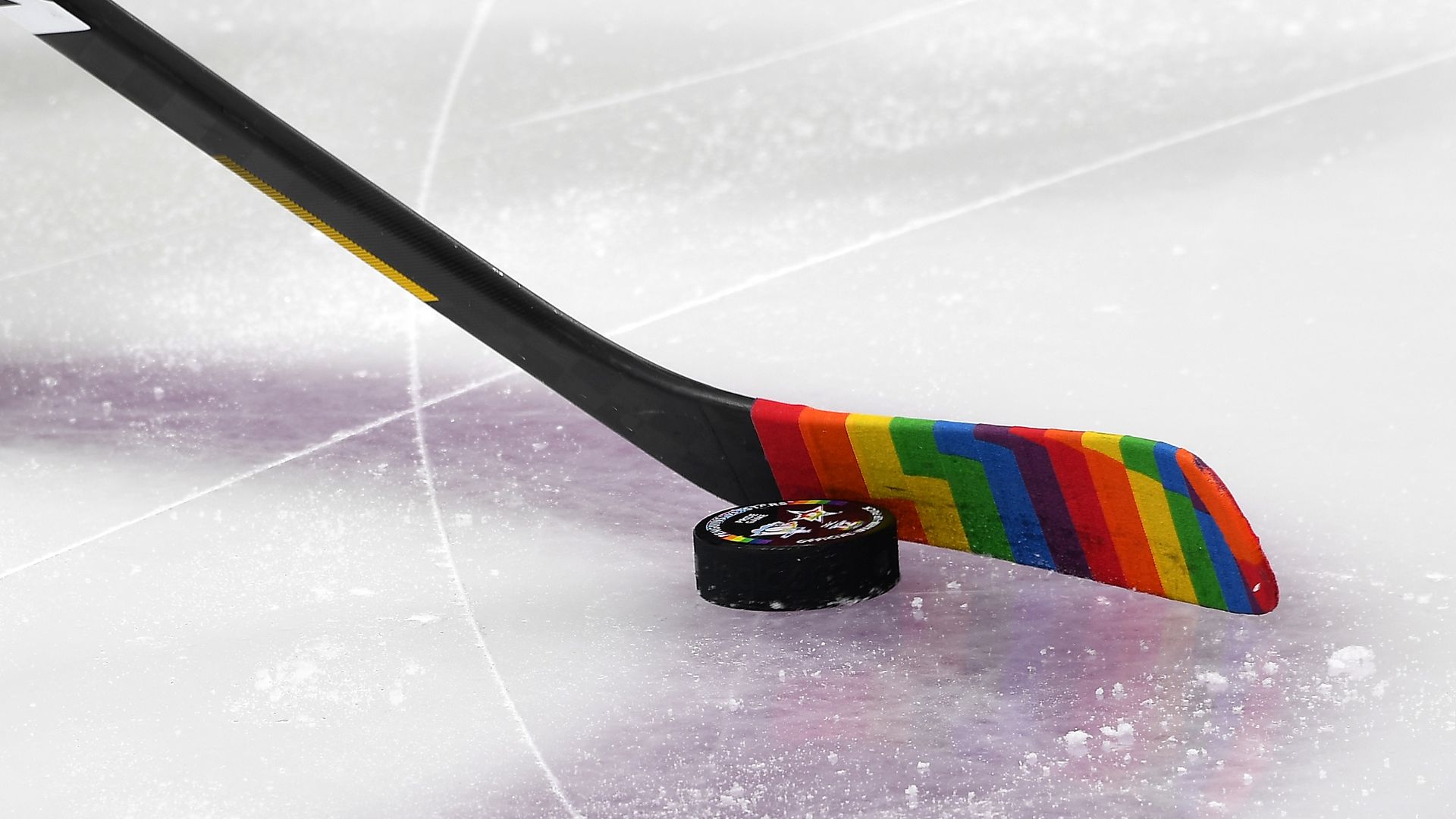 a stick with Pride tape