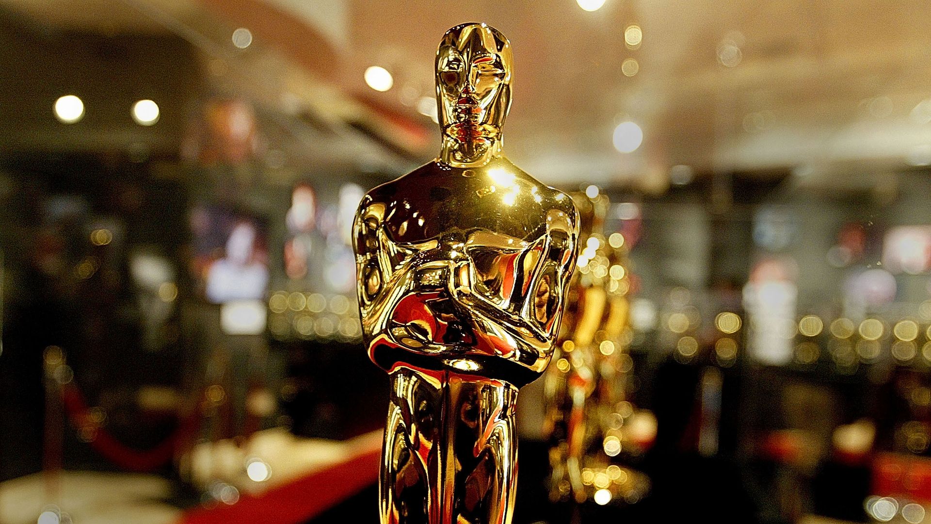 A line of Oscar statuettes.