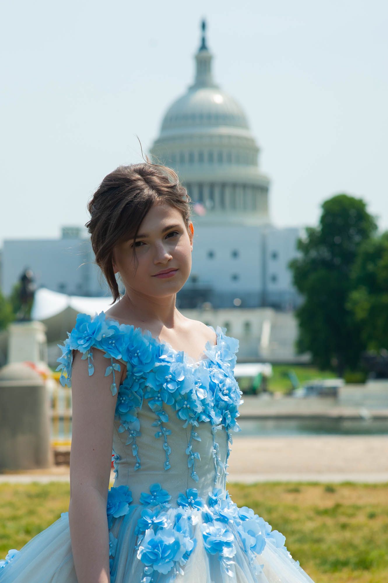 Michael Coppola, 15, stands in front of the Captiol building at the Trans Youth Prom in Washington D.C.