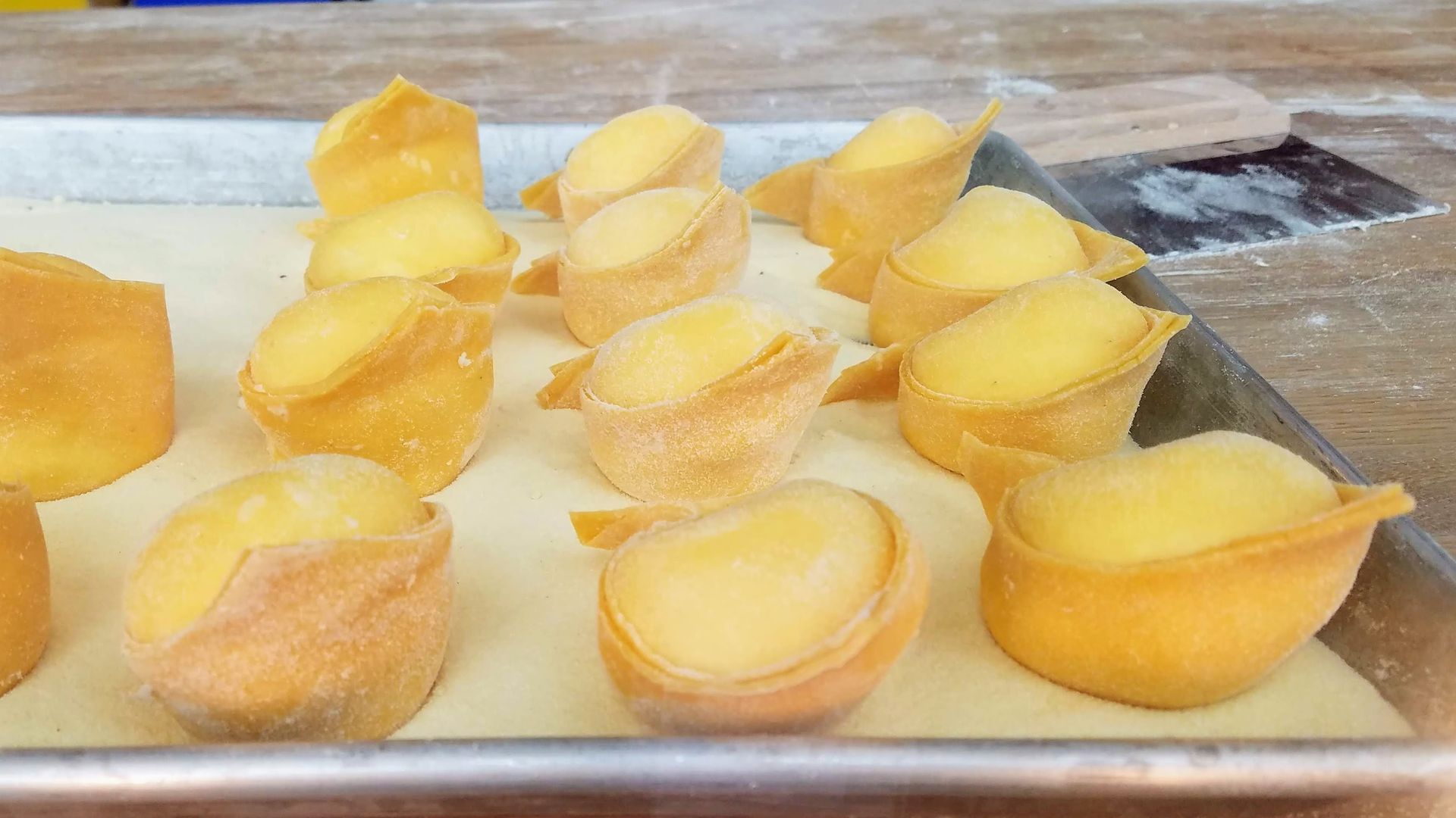 Photo of a tray of fresh pasta.