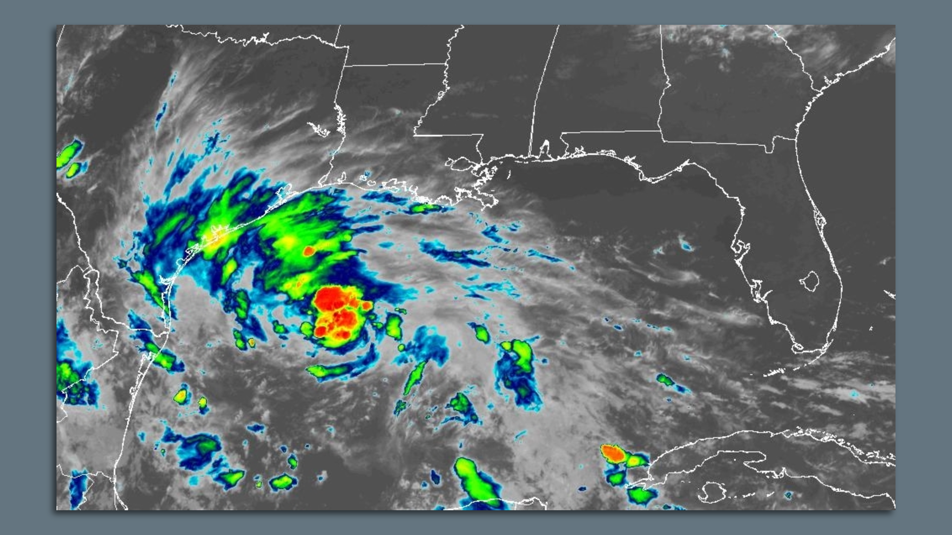 Graphic shows a satellite image of the Gulf of Mexico with a tropical depression brewing