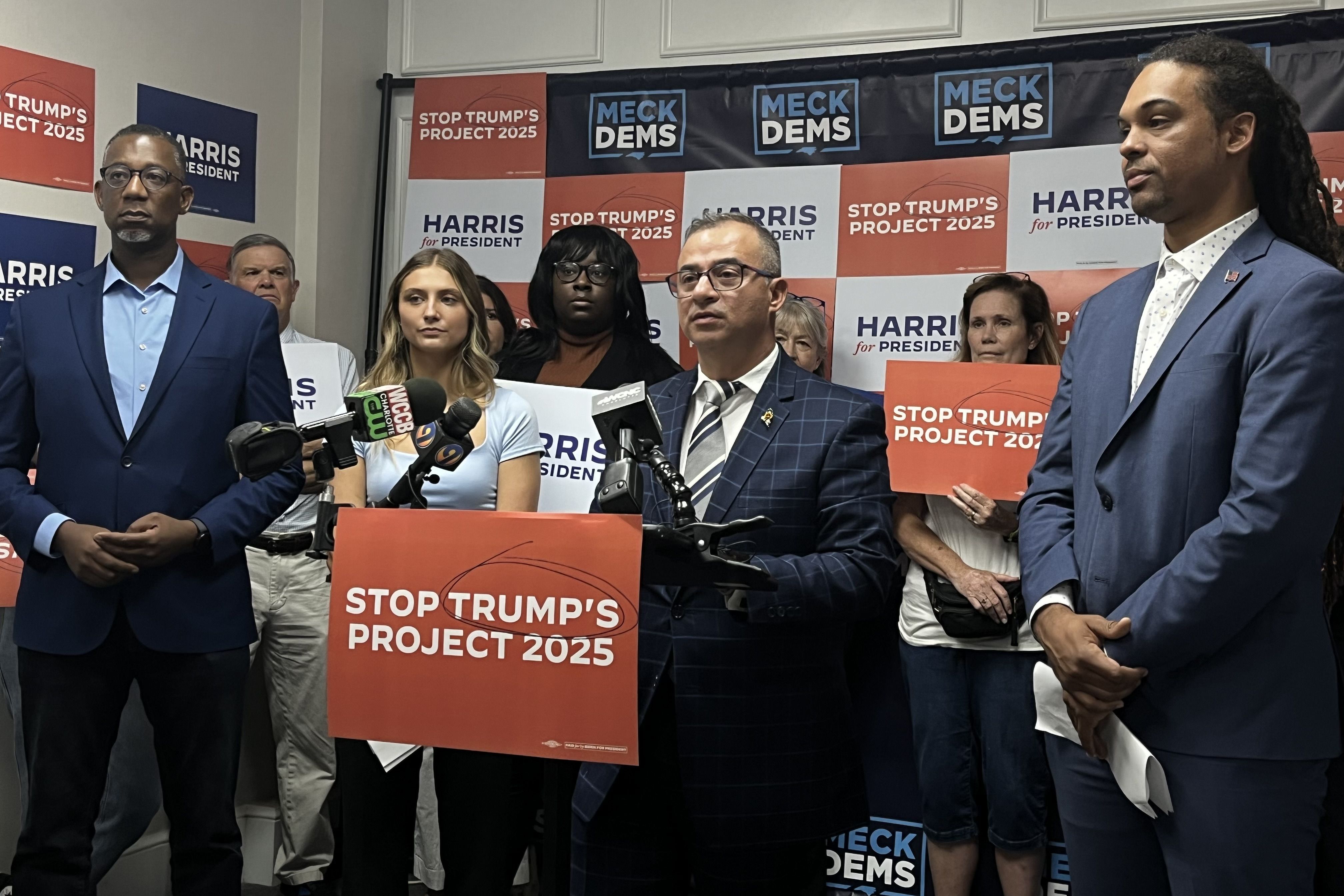 Manolo Betancu speaks at a podium
