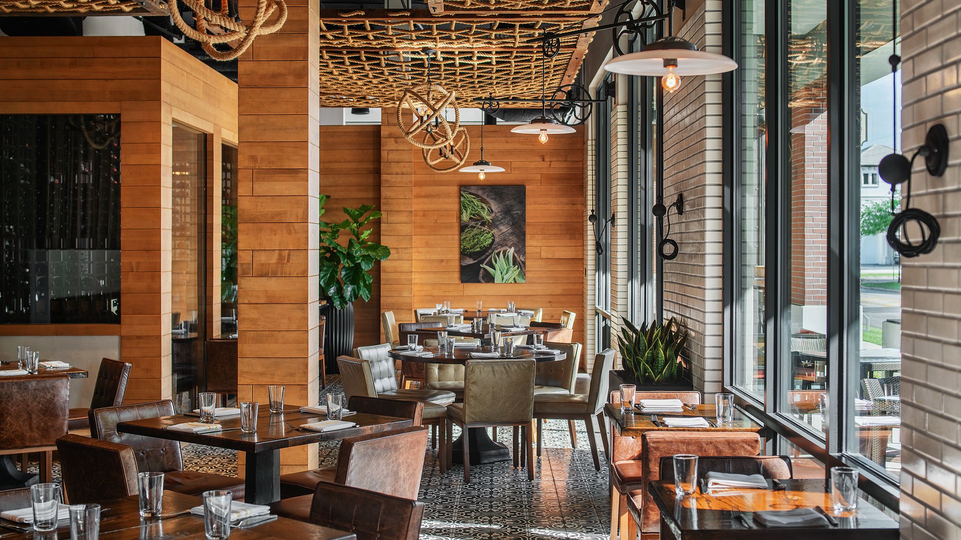 A photograph of an empty dining room at Elevage at the Epicurean