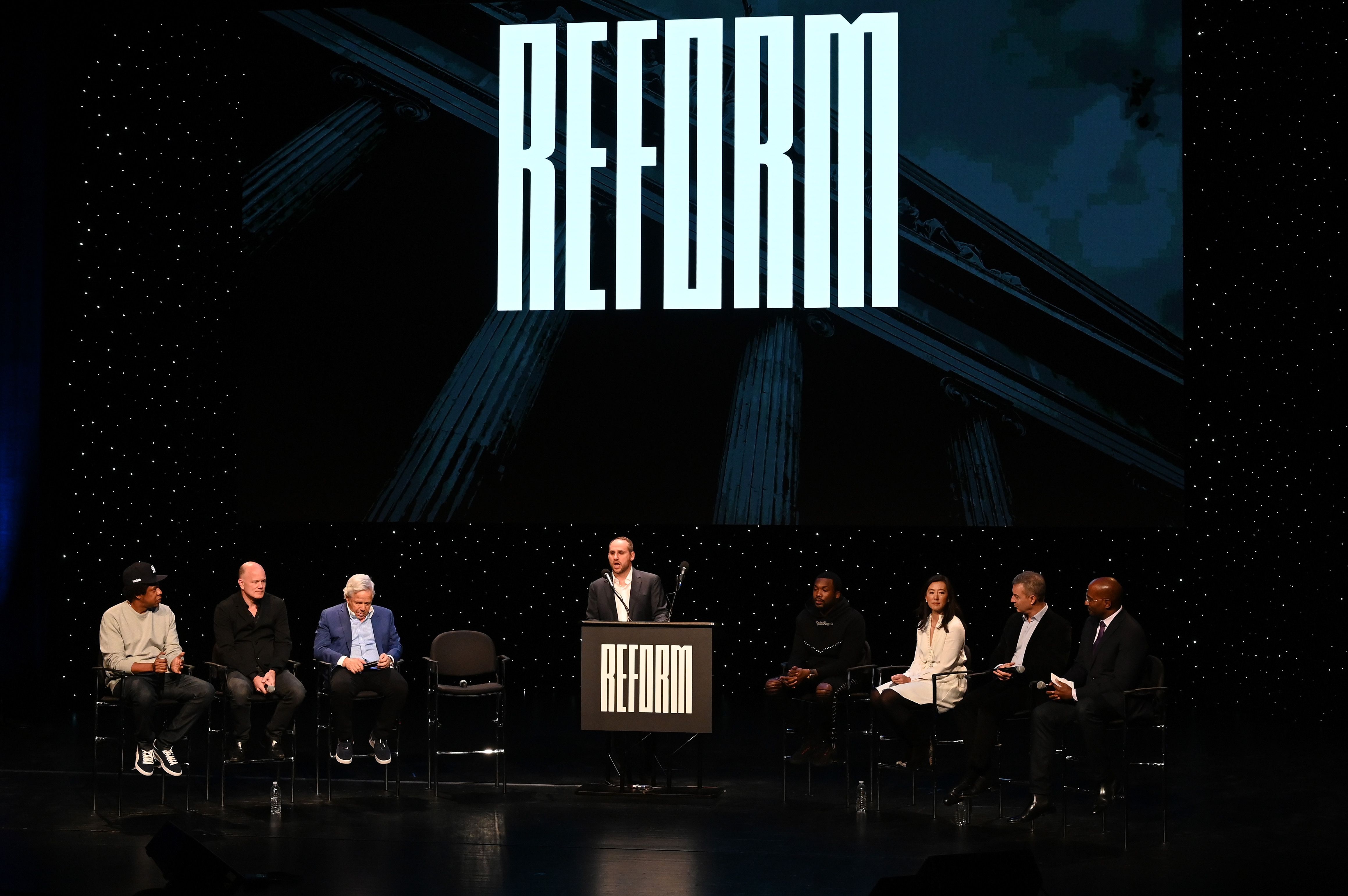 Shawn "Jay-Z" Carter, Michael Novogratz, Robert Kraft, Michael Rubin, Meek Mill, Clara Wu Tsai, Dan Loeb, Van Jones speak onstage during the launch of The Reform Alliance at John Jay College in January 2019.
