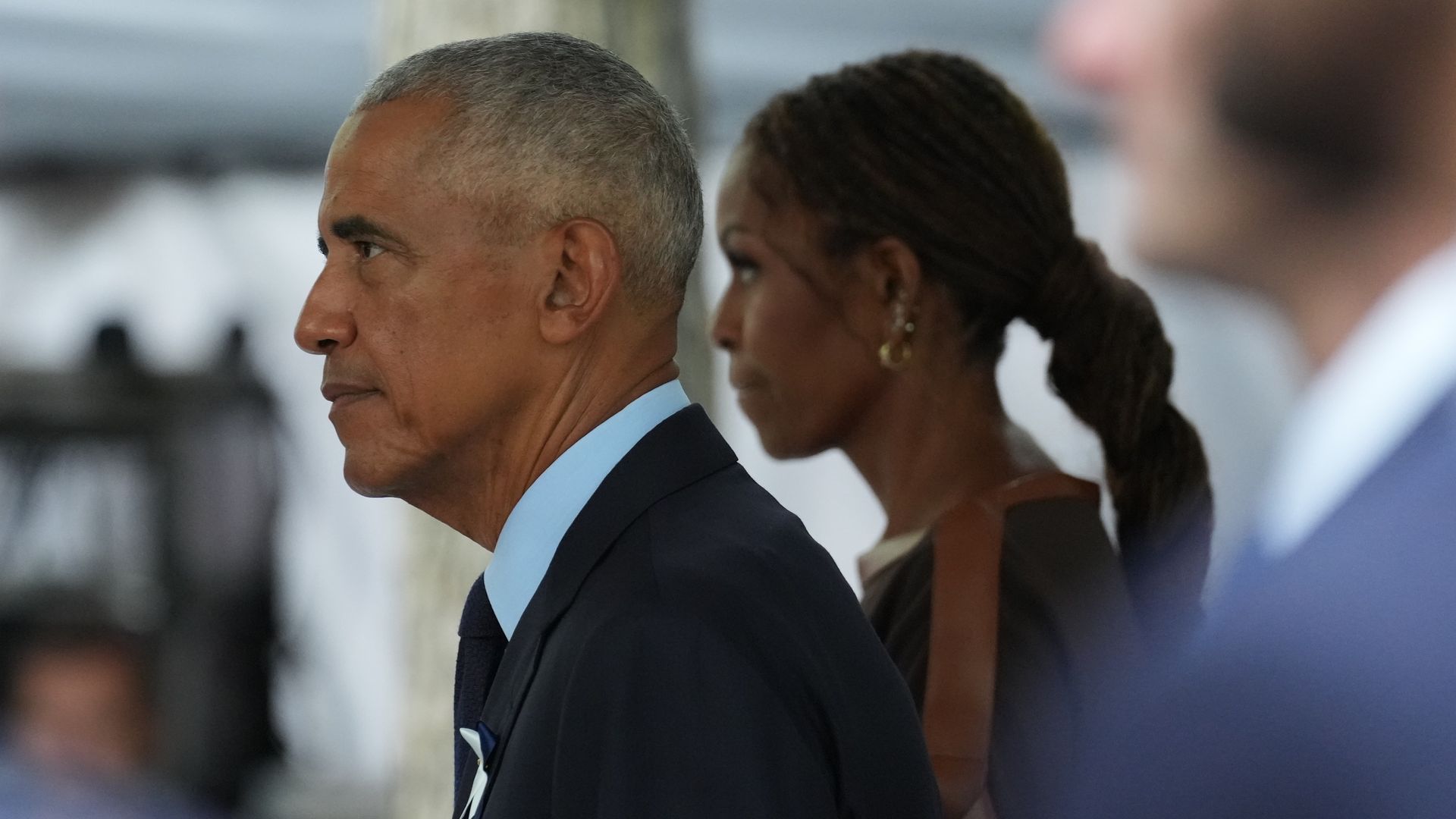 Former President Obama and former First Lady Michelle Obama arrive at the memorial for a ceremony to commemorate the 25th anniversary of the September 11th terrorist attacks on the World Trade Center.
