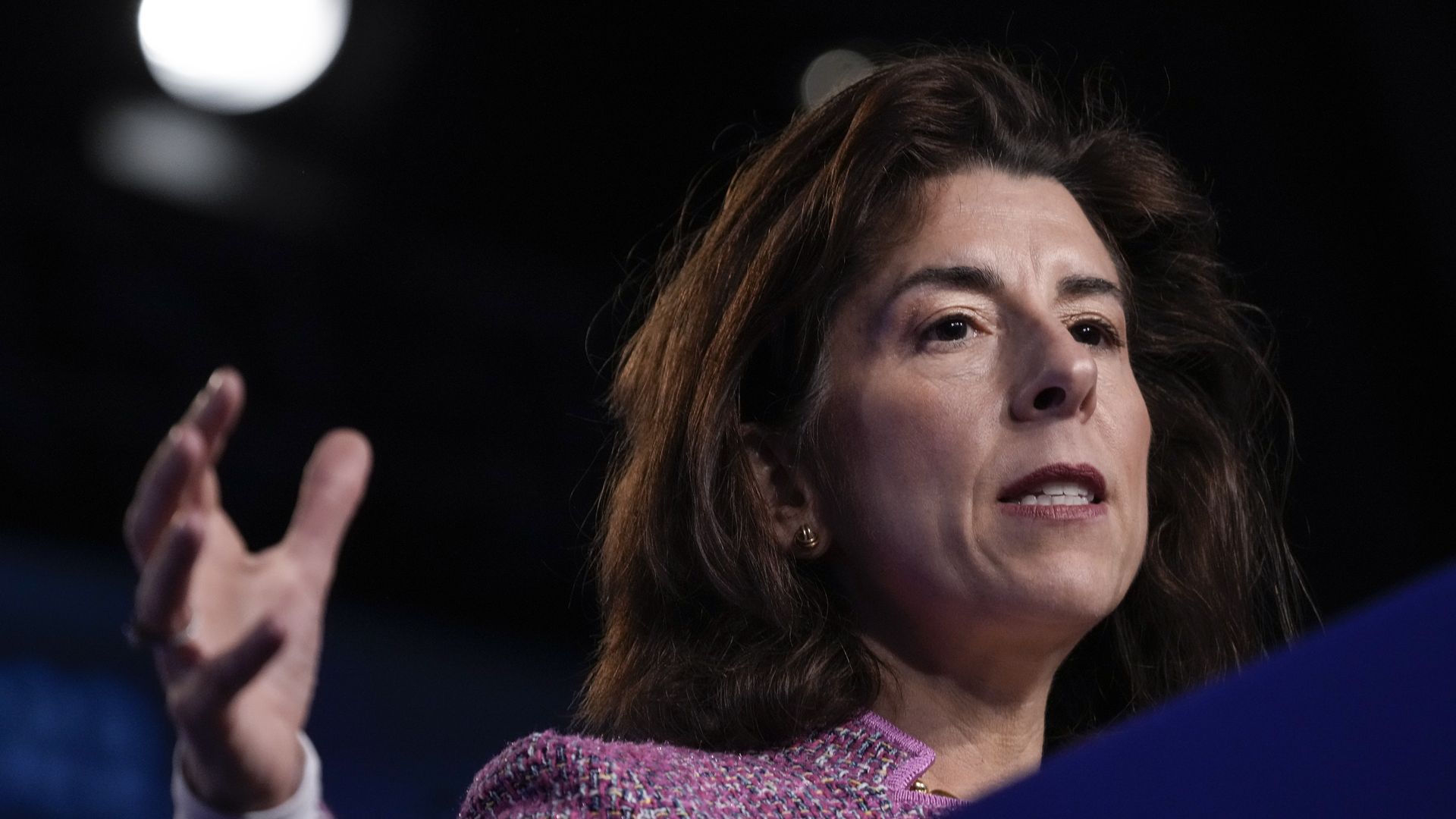 Photo of Gina Raimondo speaking while gesturing with her right hand
