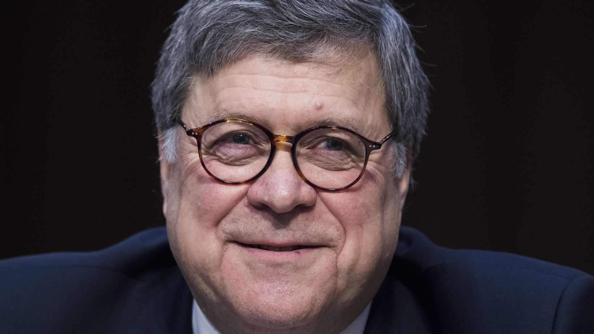 Bill Barr smiling.
