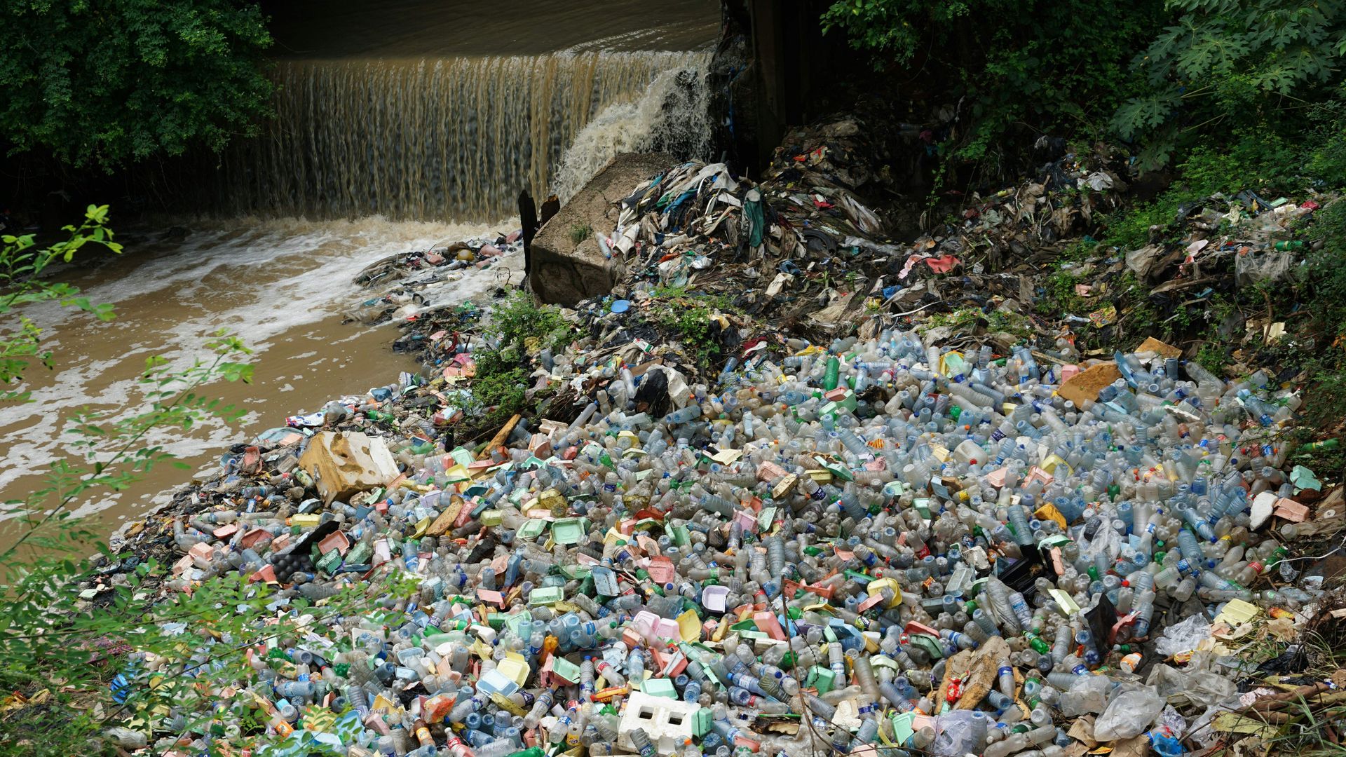 Trash piles up in water supply in Lagos, Nigeria