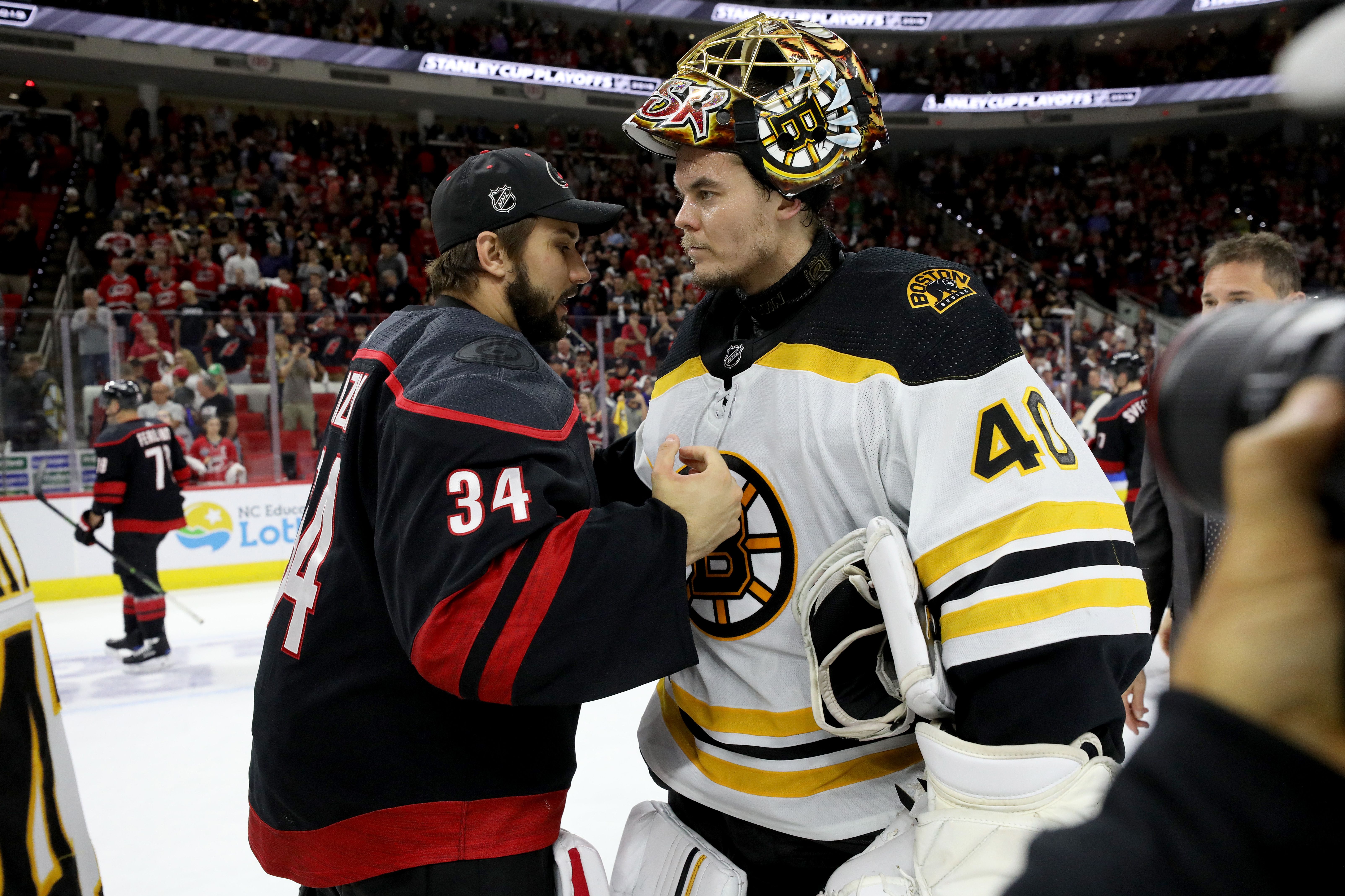 Tuukka Rask shakes hands with Petr Mrazek