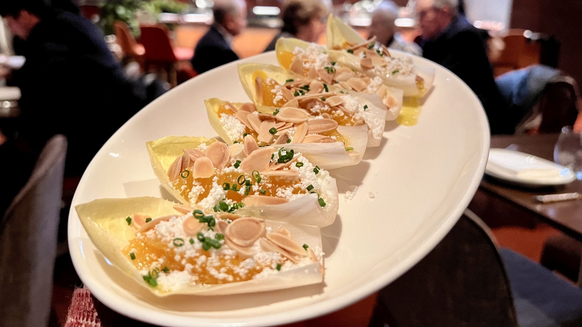 Photo of a plate of salad at a restaurant. 