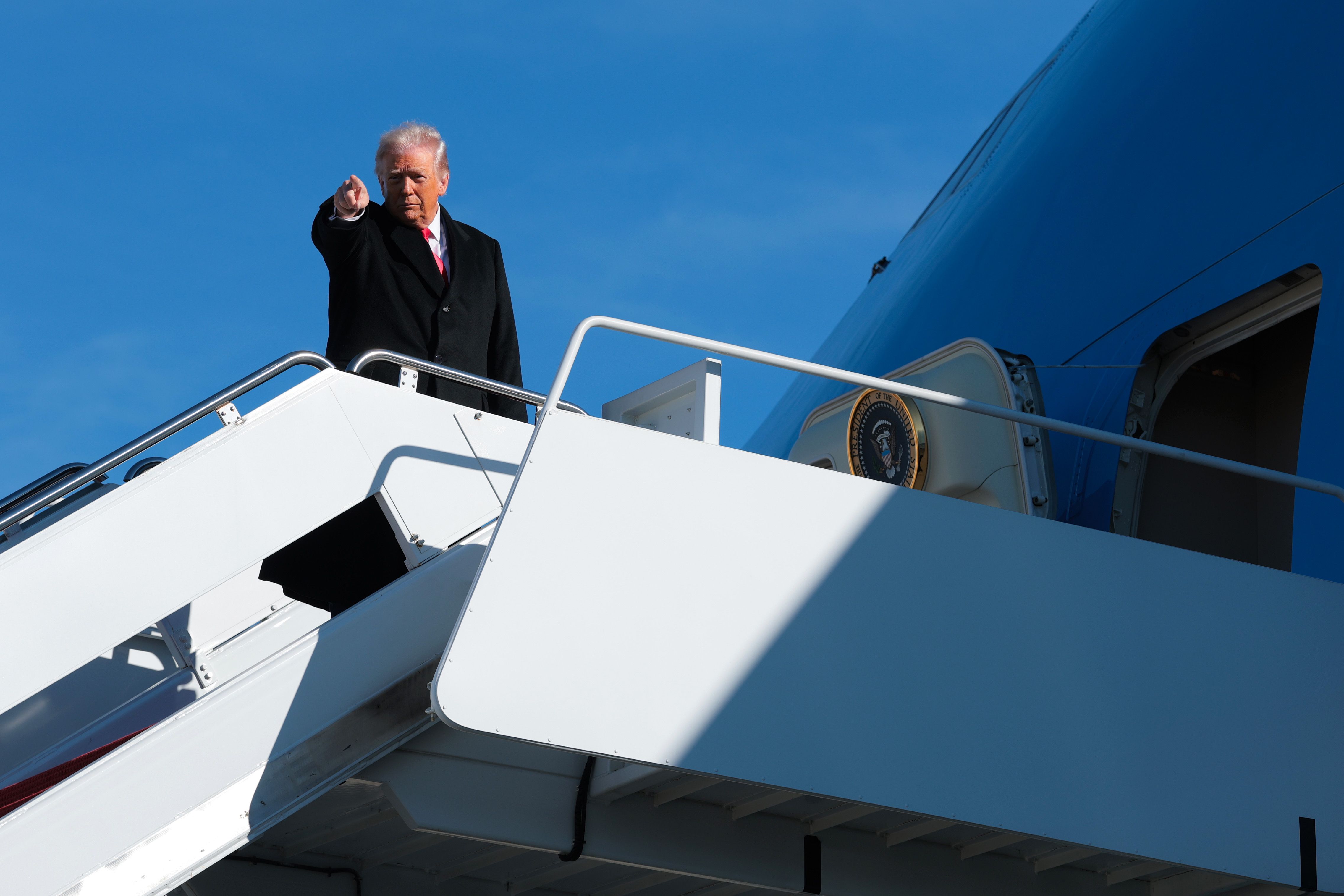 President Trump boards Air Force One before traveling to Michigan last week.