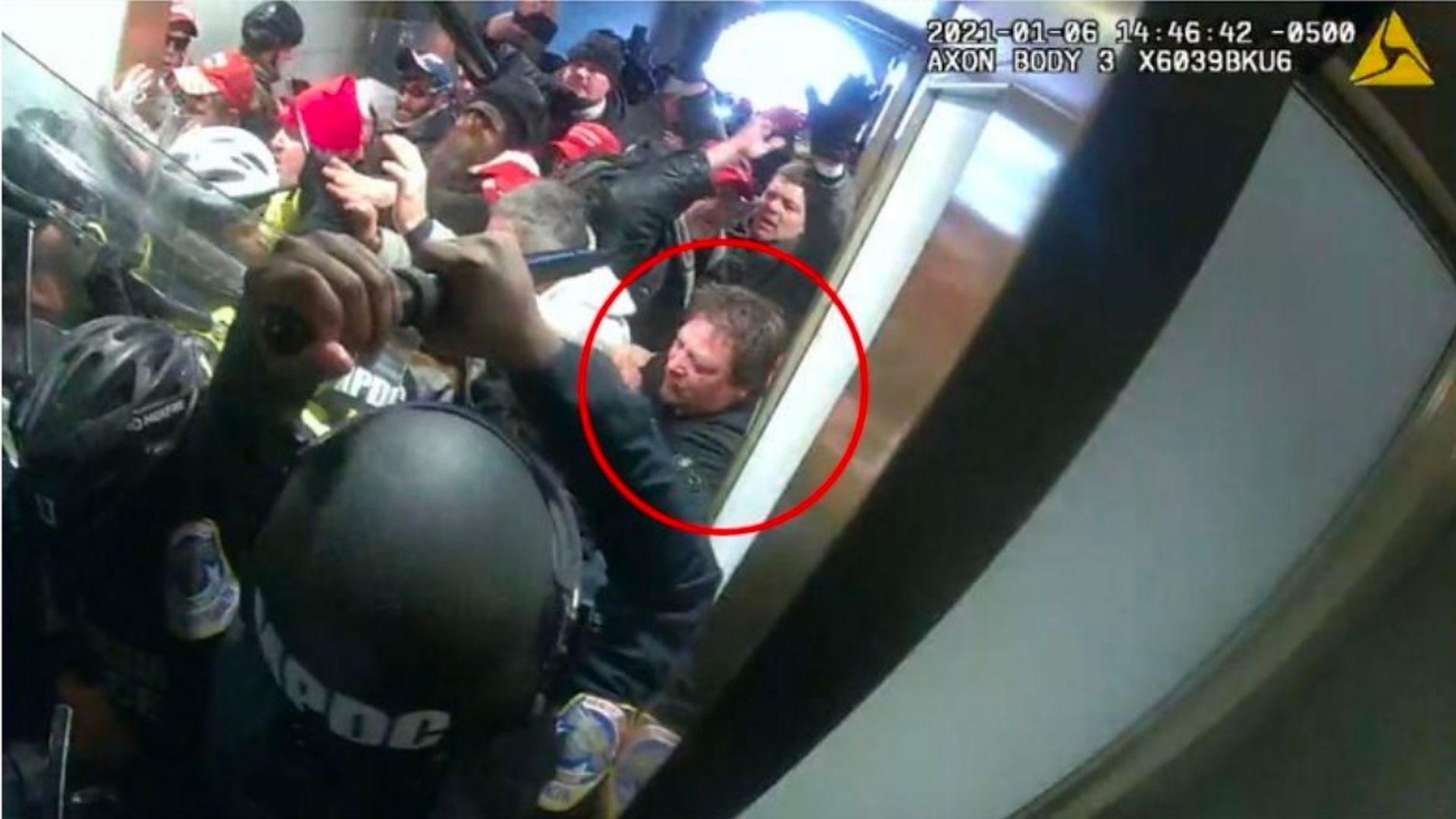 Body worn camera footage showing a man identified as Troy Allen Koen at the front of a mob fighting with officers on Jan. 6, 2021.