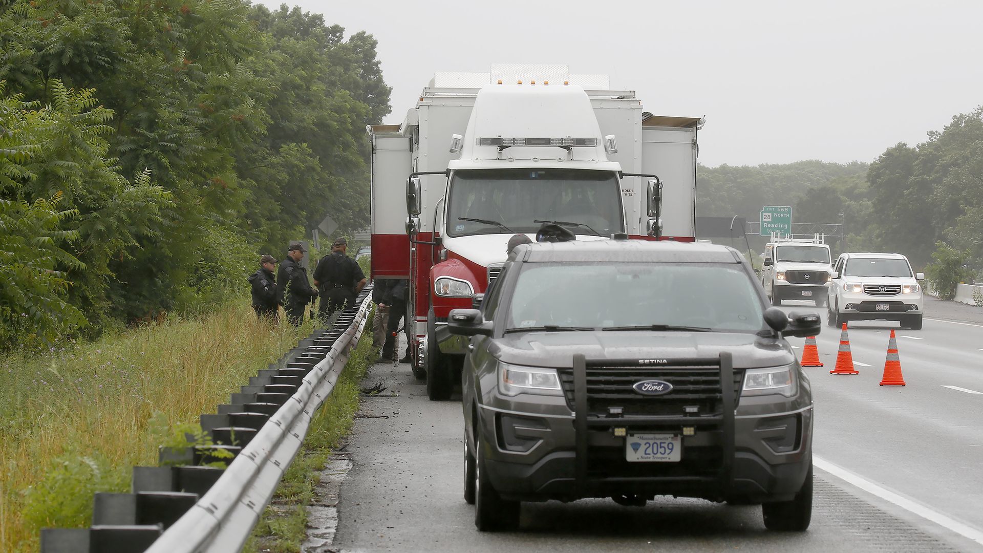 Interstate 95 in Wakefield is open as State Police stand along the guardrail near miler marker 57 as the investigation continues into an armed stand off with police, July 3, 2021 Wakefield, MA. (