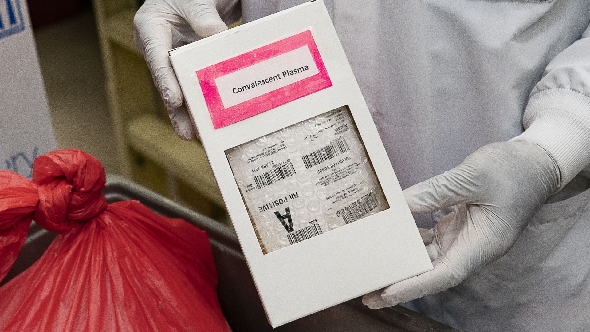 A lab technician freeze packs donated convalescent plasma donated by recovered COVID-19 patients.