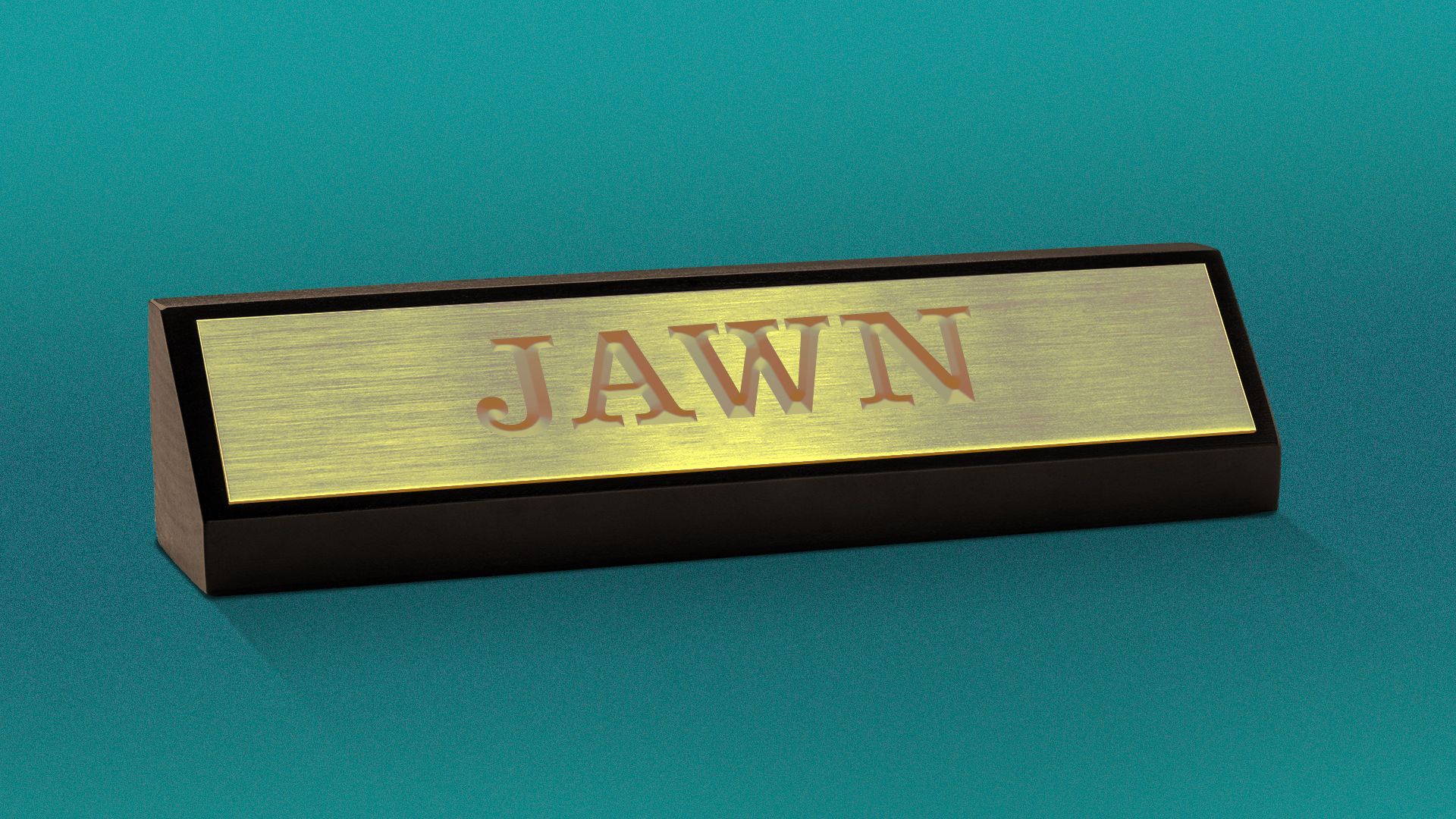 Illustration of a desk nameplate with the word JAWN embossed on it.