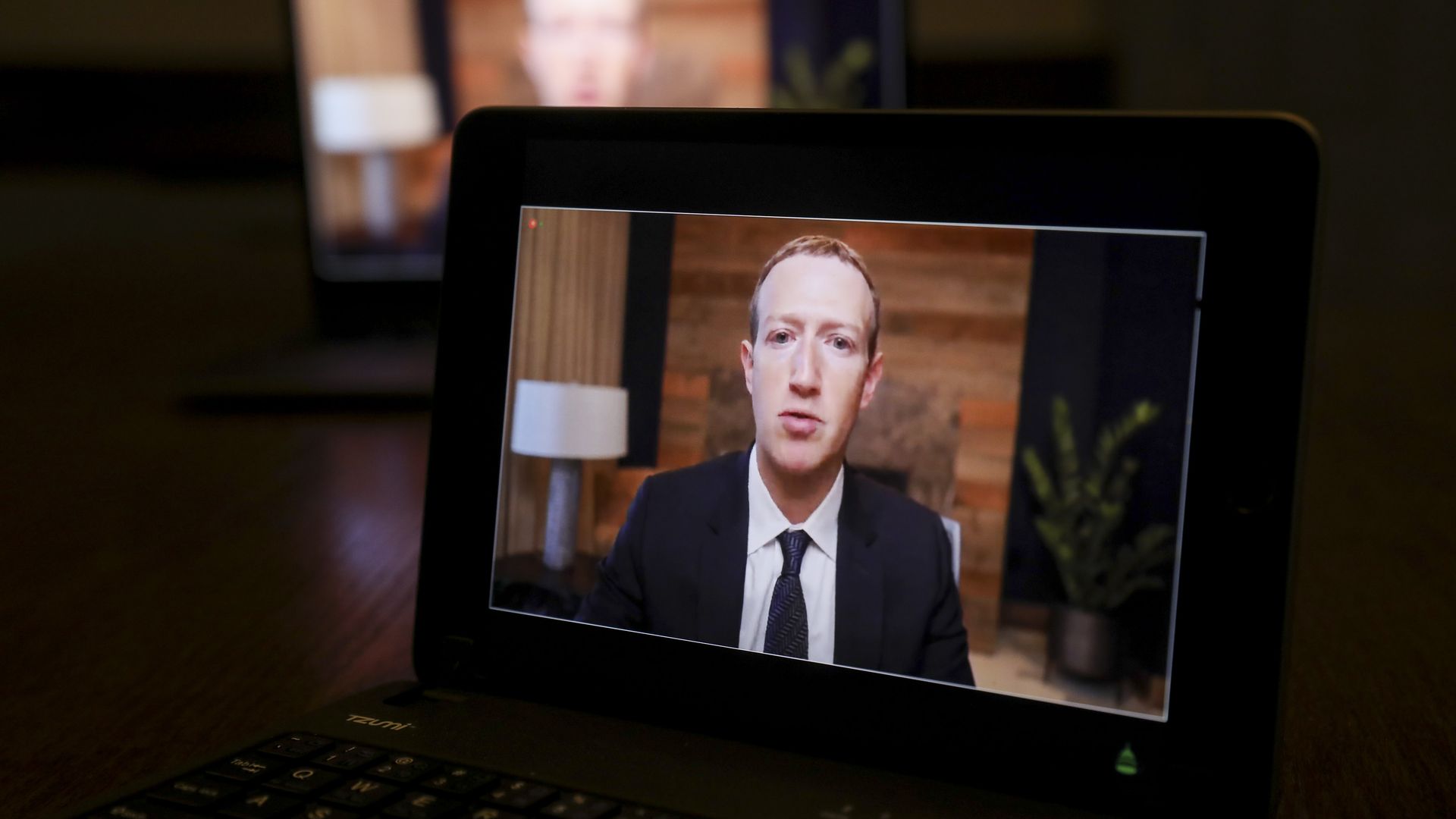 Mark Zuckerberg, Facebook CEO, speaks virtually at a House hearing on a laptop computer in Tiskilwa, Illinois, U.S., on Thursday, March 25