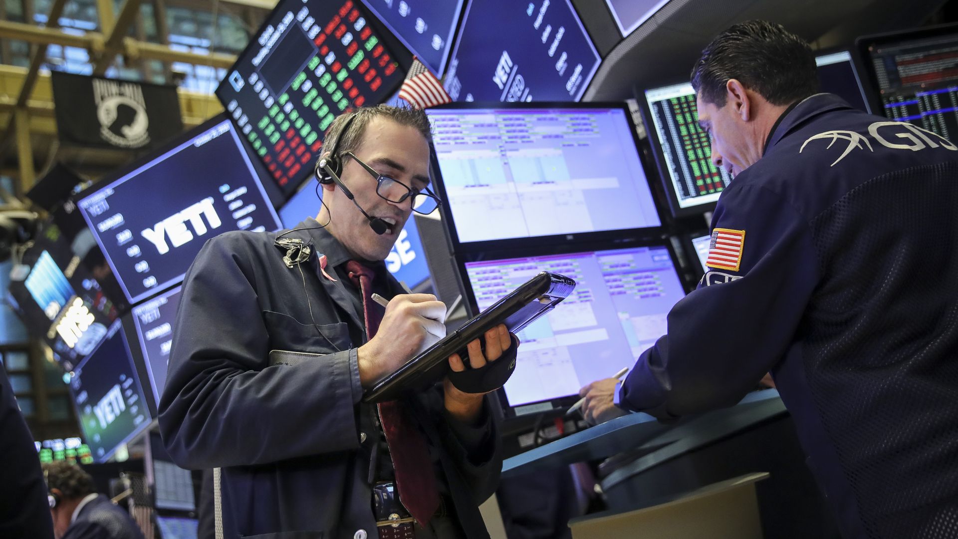 Trader on the floor of the New York Stock Exchange