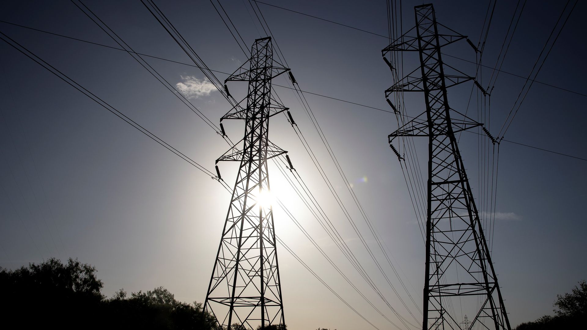 Power lines under a hot sun