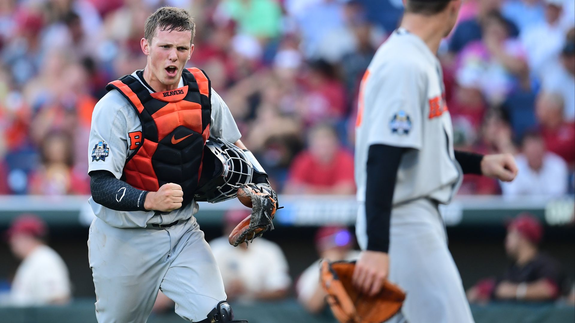 This image shows Adley Rutschman running across the field.