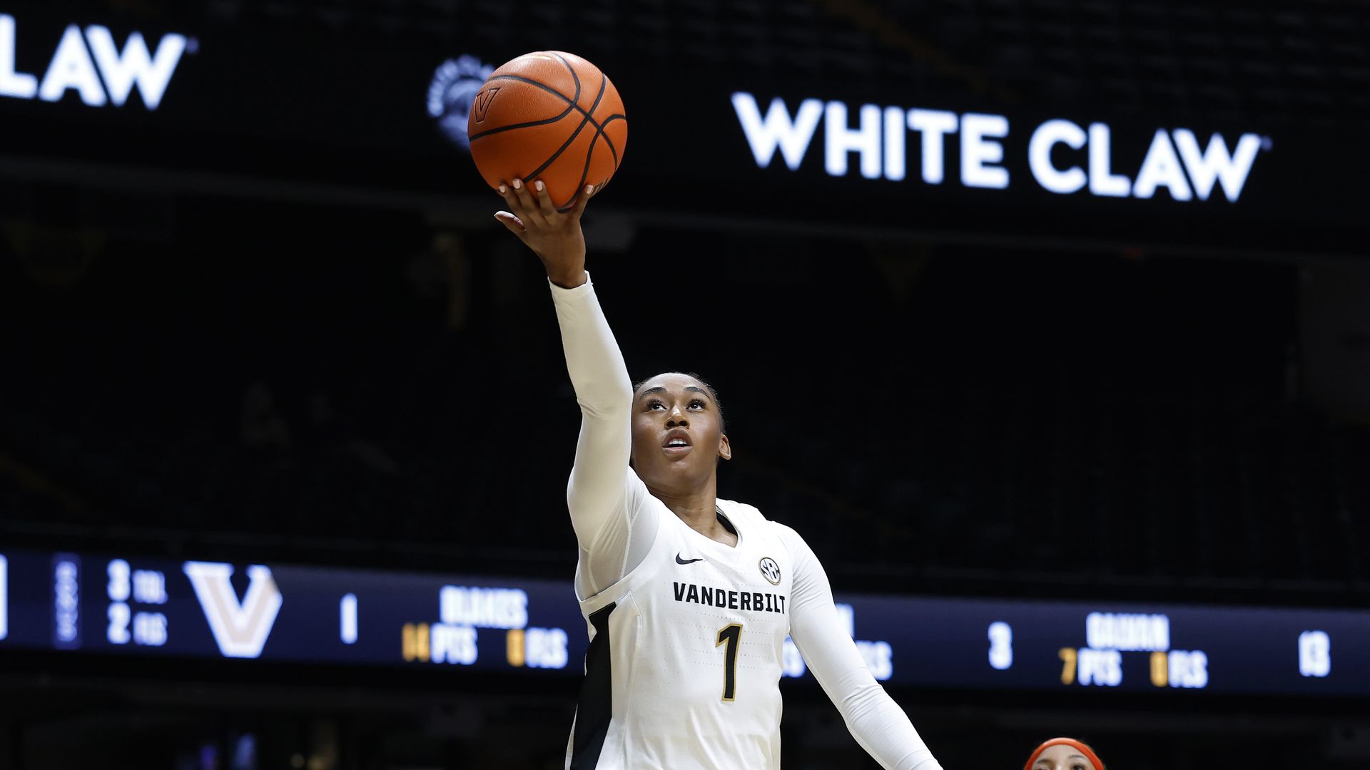 Mikayla Blakes playing basketball