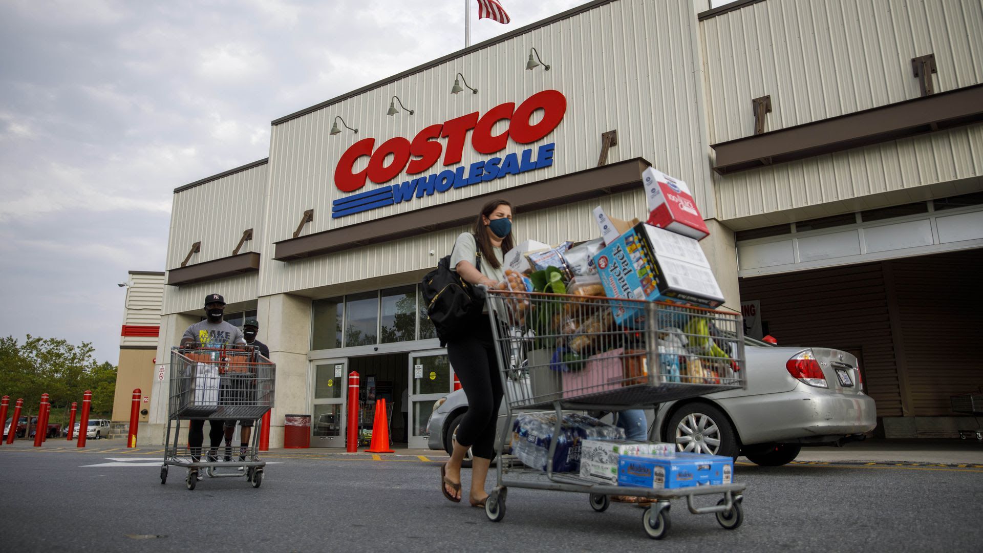 Shoppers exit a Costco in Washington, D.C.