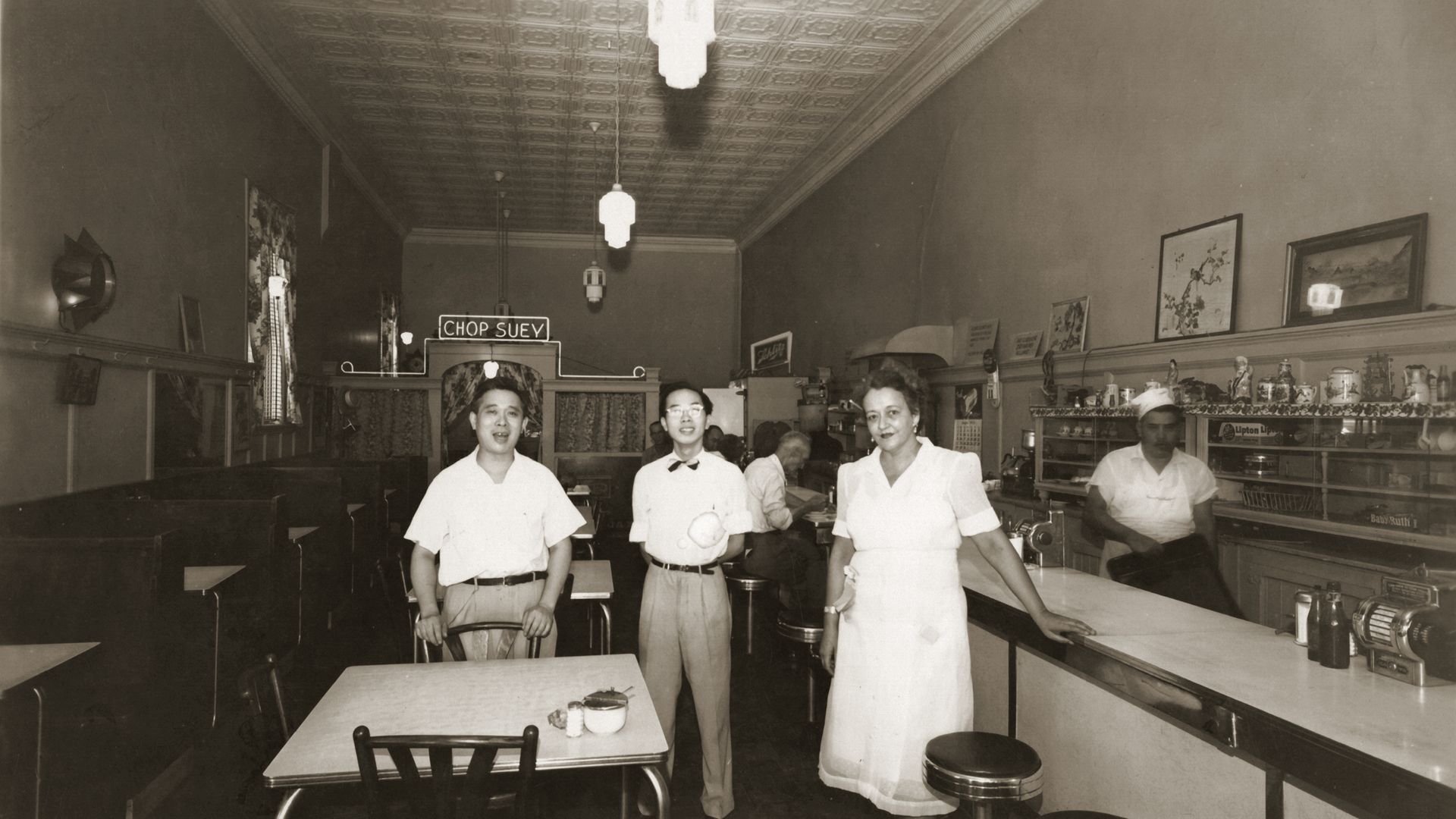 The owner, his son and a server at the Sam Wah Cafe in Austin.