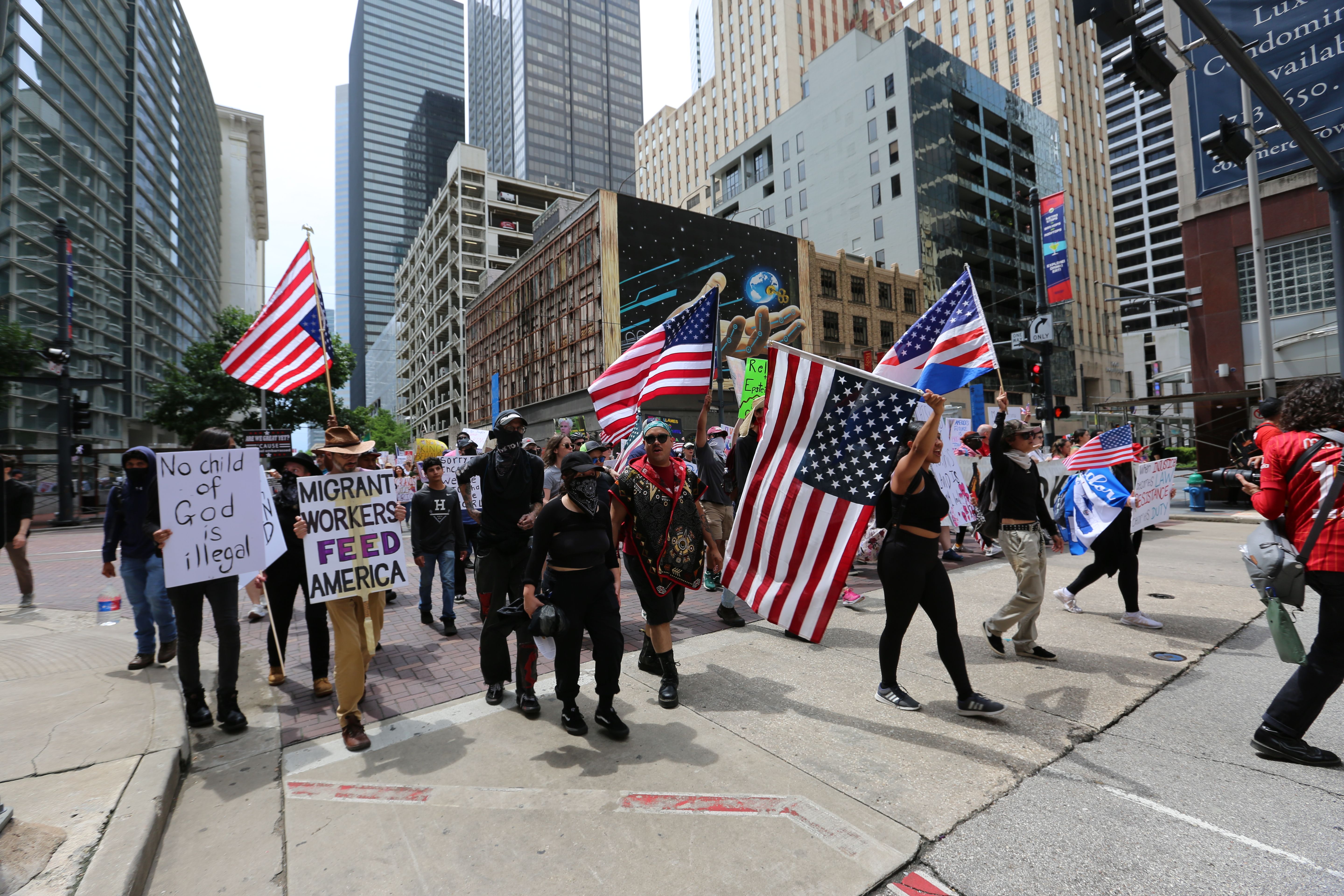 Thousands of protesters march through downtown Houston