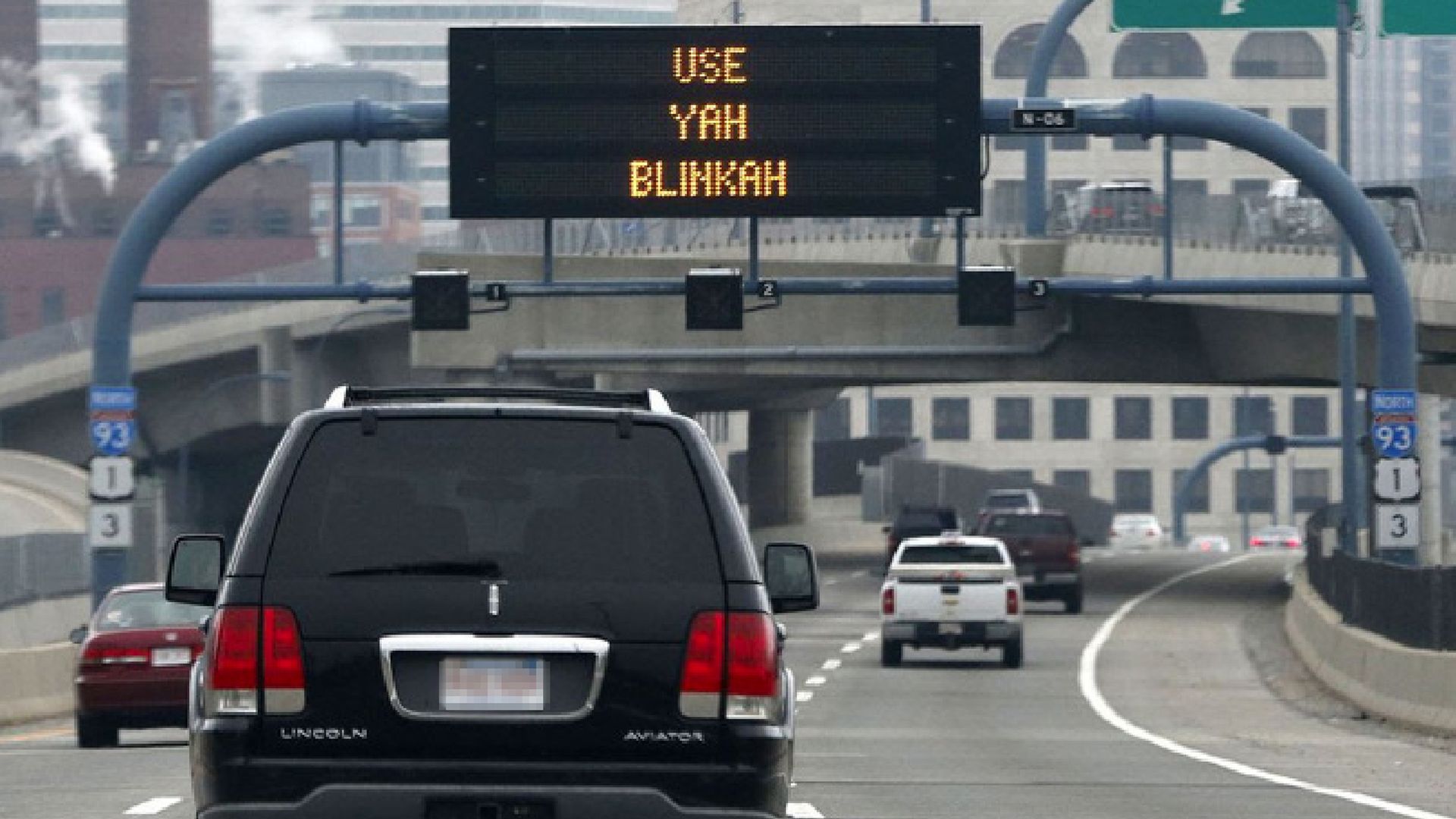 Photo of a highway sign that says "Use yah blinkah".