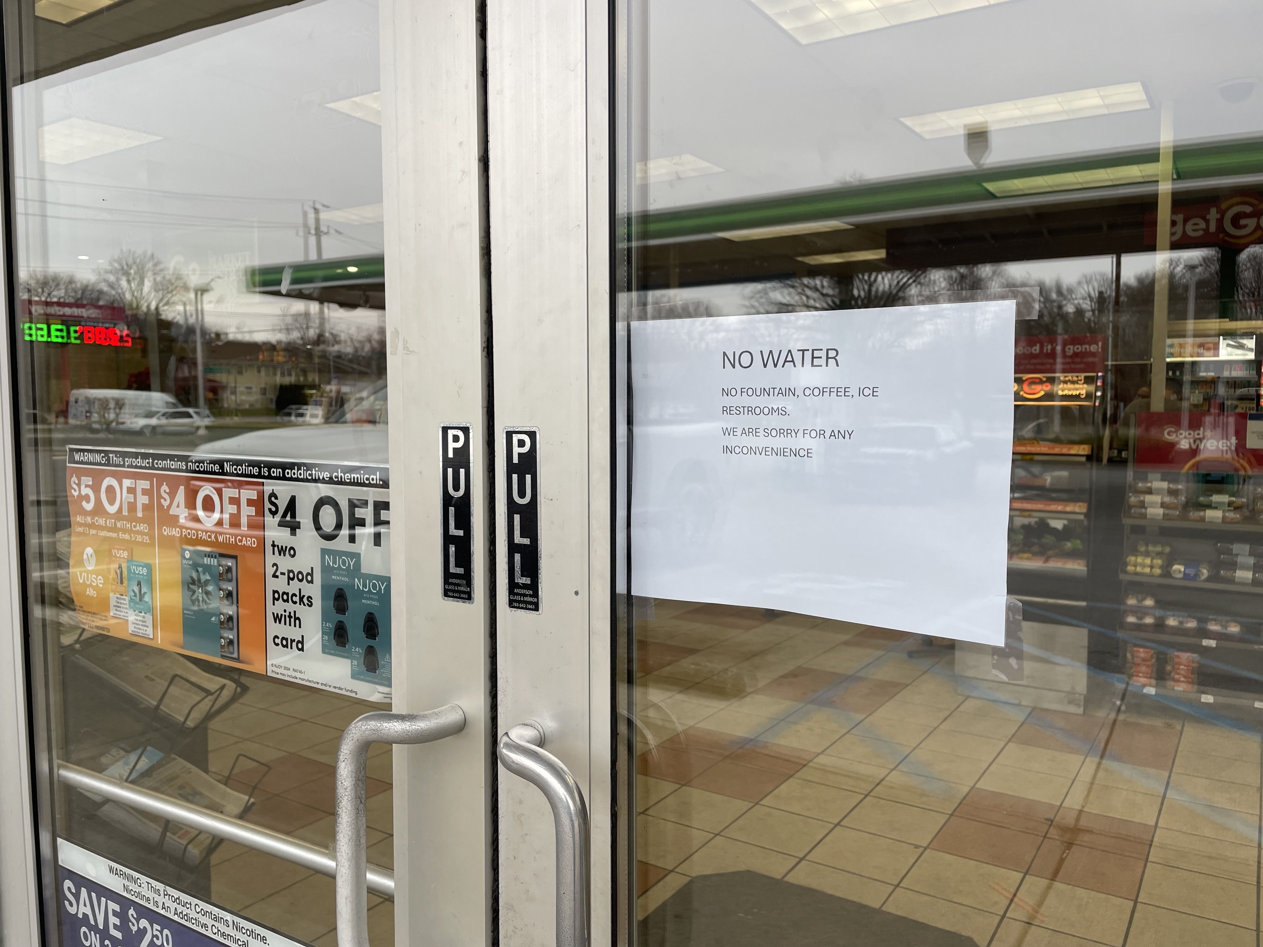 A photo of a sign in a window