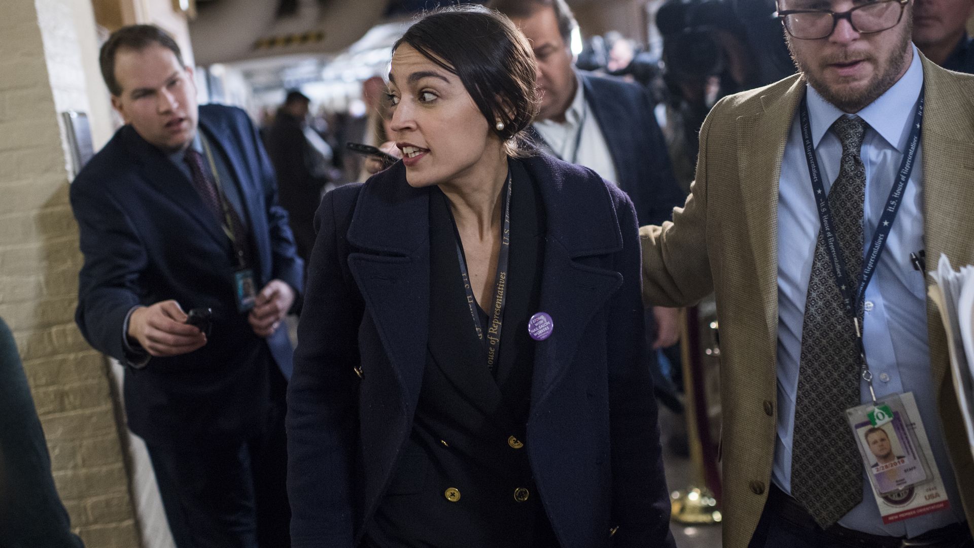 Alexandria Ocasio-Cortez in Capitol hill hallways