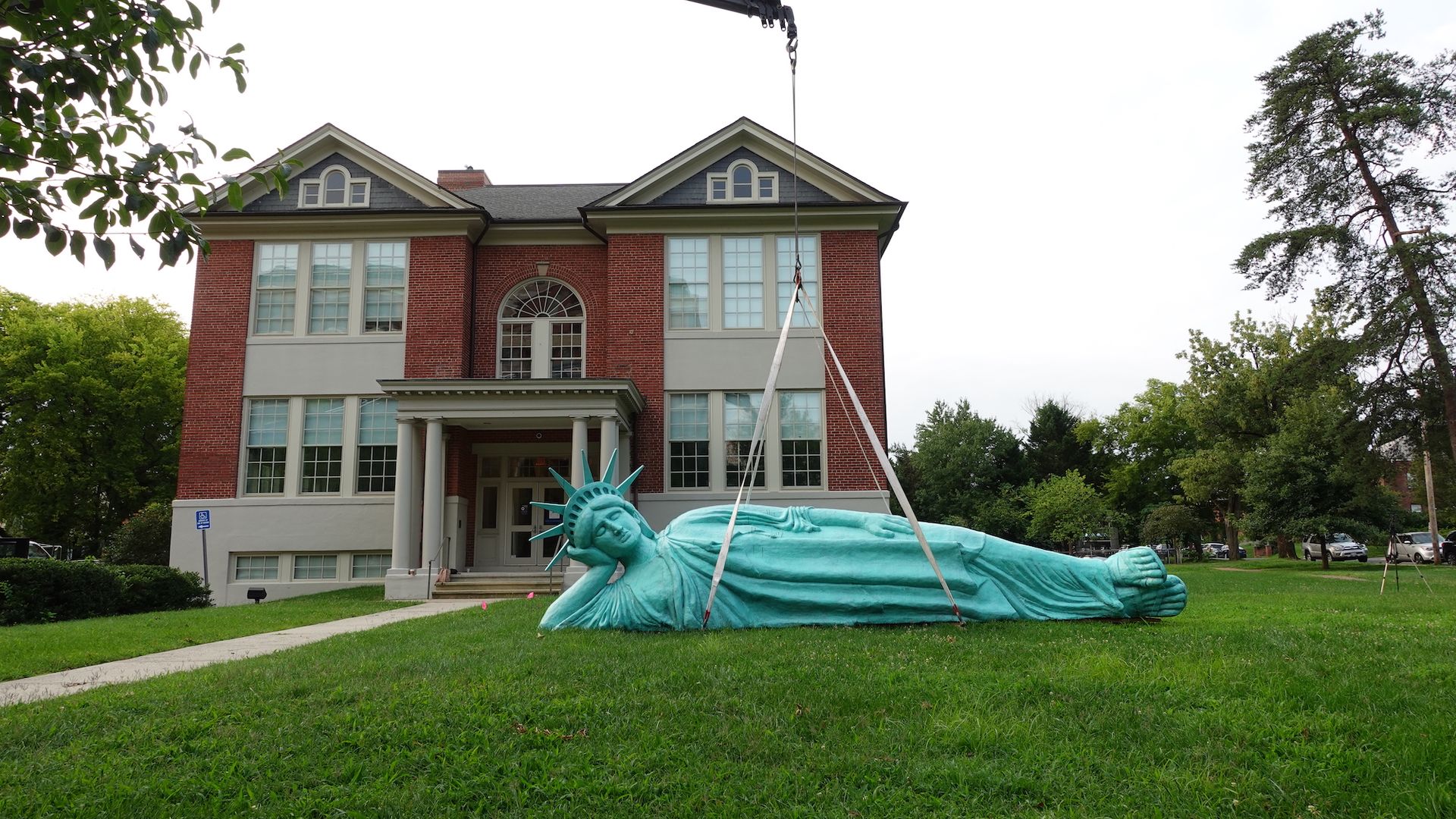 Installation of Zaq Landsberg's Reclining Liberty at MoCA Arlington. Photo: MoCA Arlington