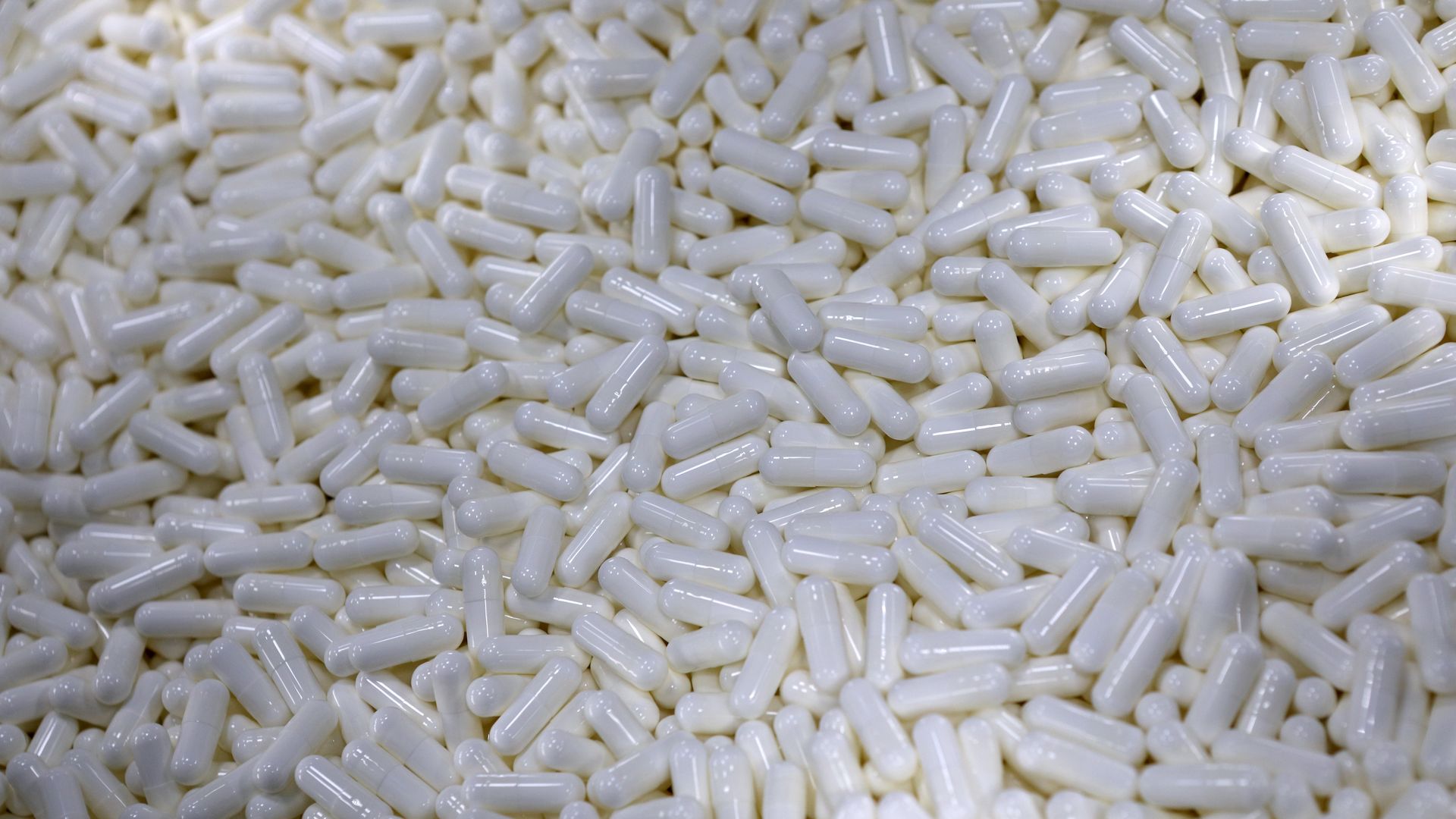 A pile of white generic drugs.