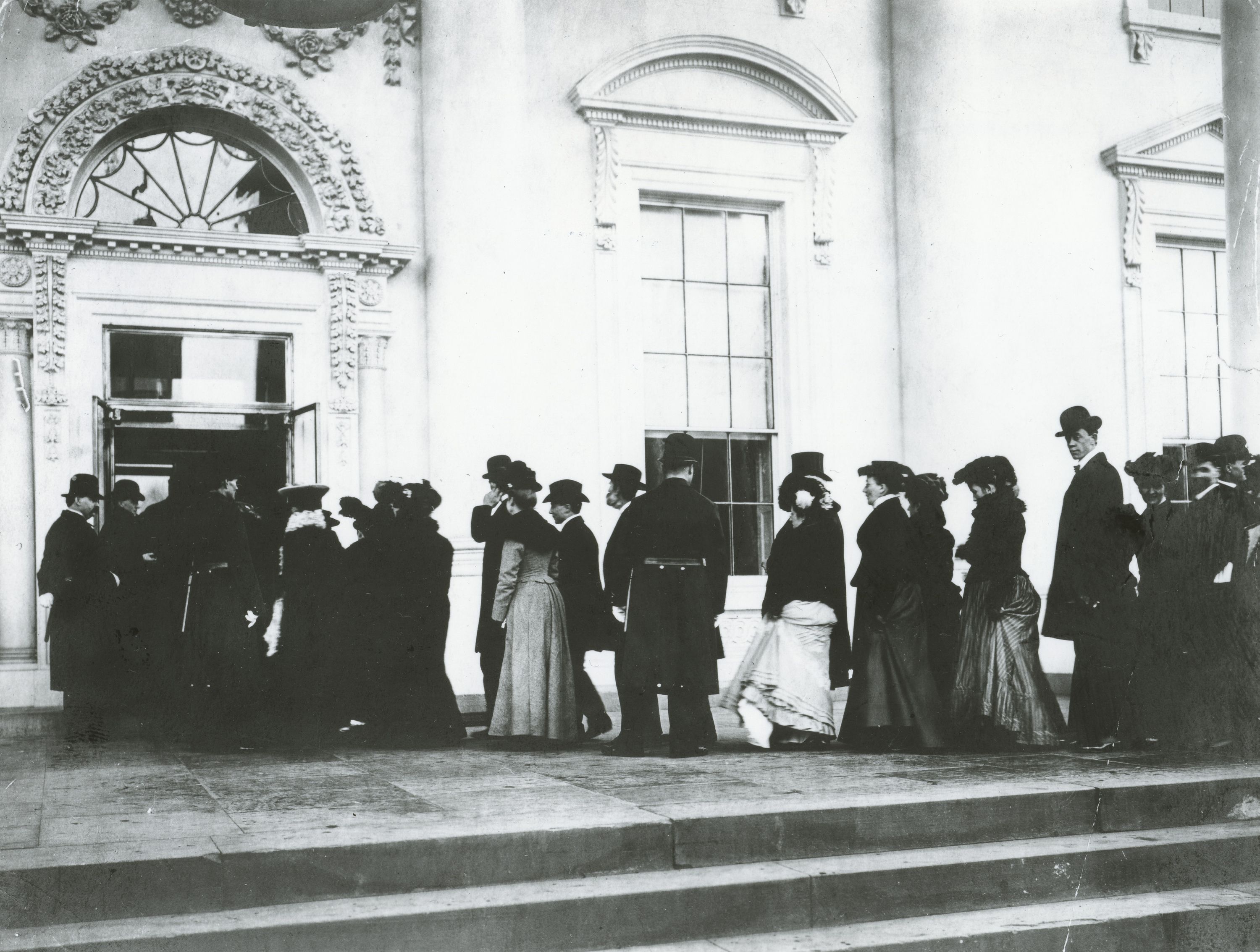 Guests dressed in their finest in 1905 at the North Portico waiting to be received by President Theodore Roosevelt during the New Year's Day public reception. 