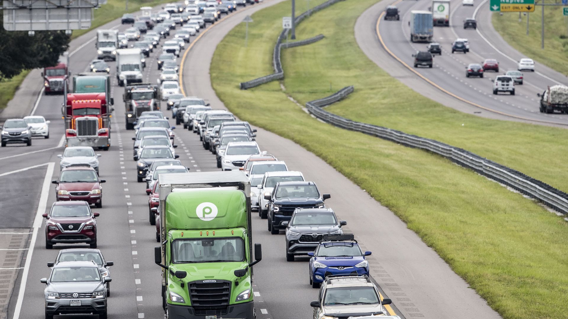 Tampa Bay area residents and drivers fill the lanes on I-4 before Hurricane Ian made landfall on Sept. 27.